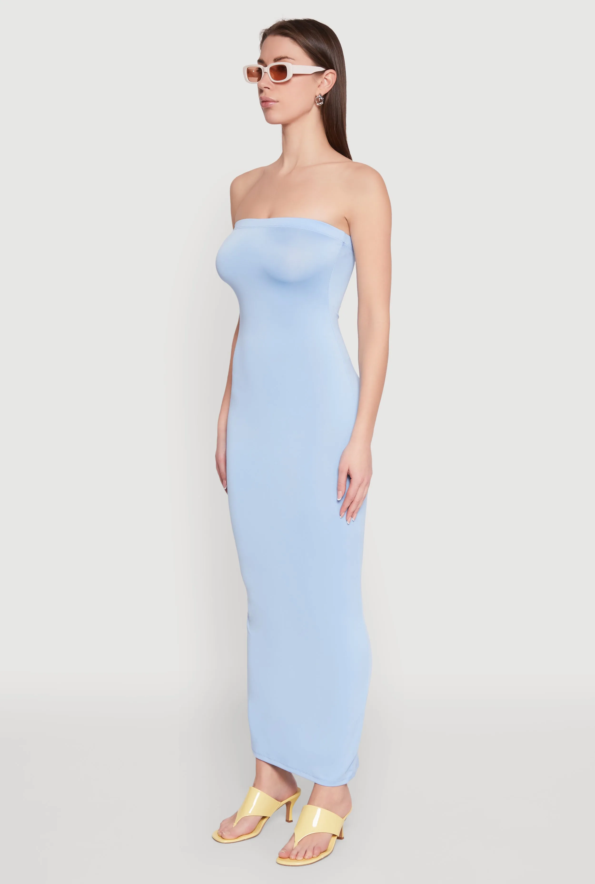 Organza Glow The soft fabric of this maxi dress provides a luxurious feel while remaining comfortable Slit Back Maxi Tube Dress