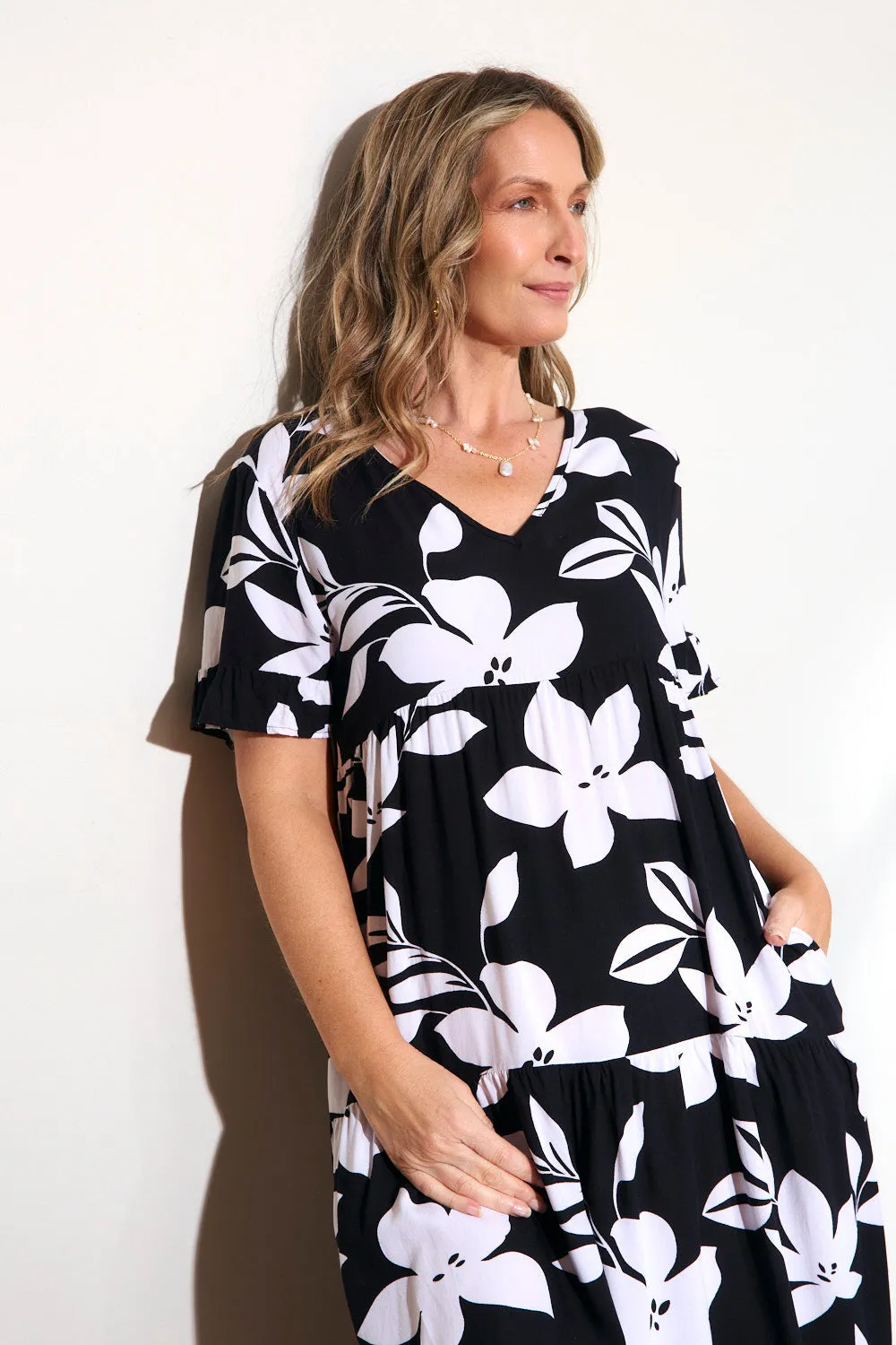 Shell Beach The simple design of this dress ensures that it will never go out of style Sabrina Maxi Dress in Night Blooms