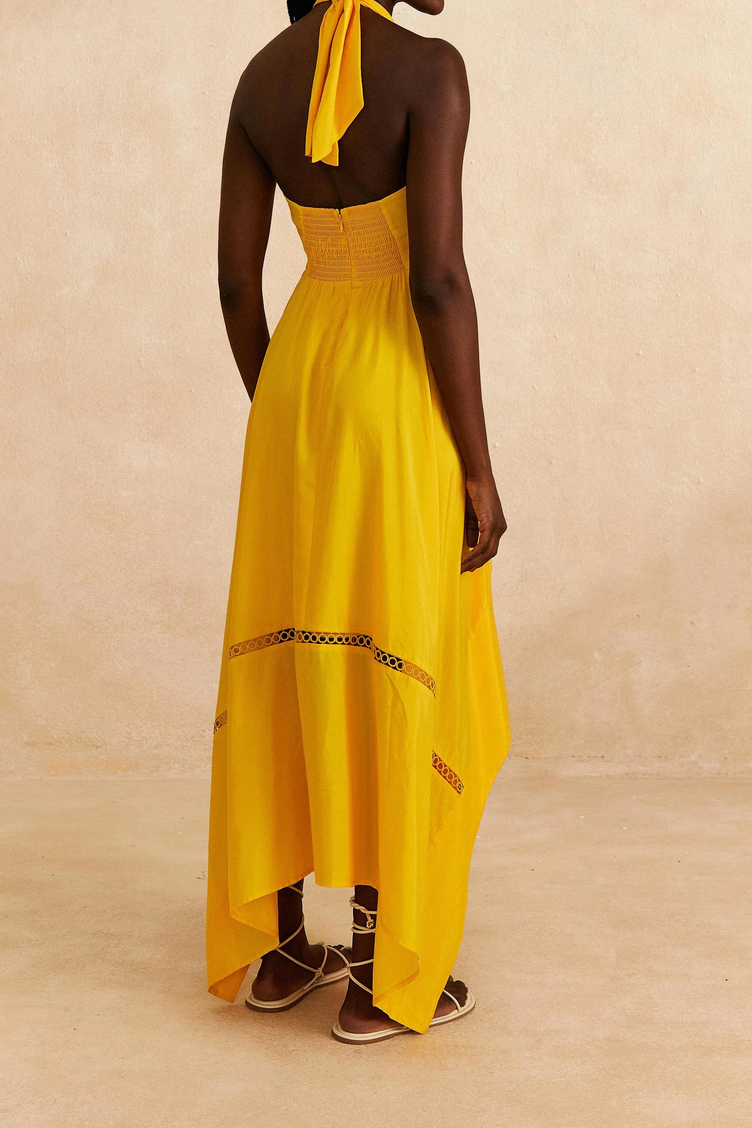 This maxi dress offers an effortlessly chic look with a relaxed fit and elegant style Yellow Sleeveless Maxi Dress