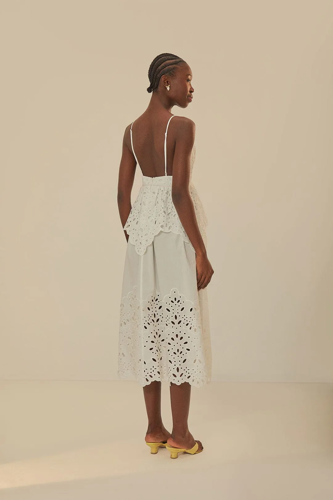 This maxi dress offers an effortlessly chic look with a relaxed fit and elegant style Golden Wave White Laise Sleeveless Maxi Dress