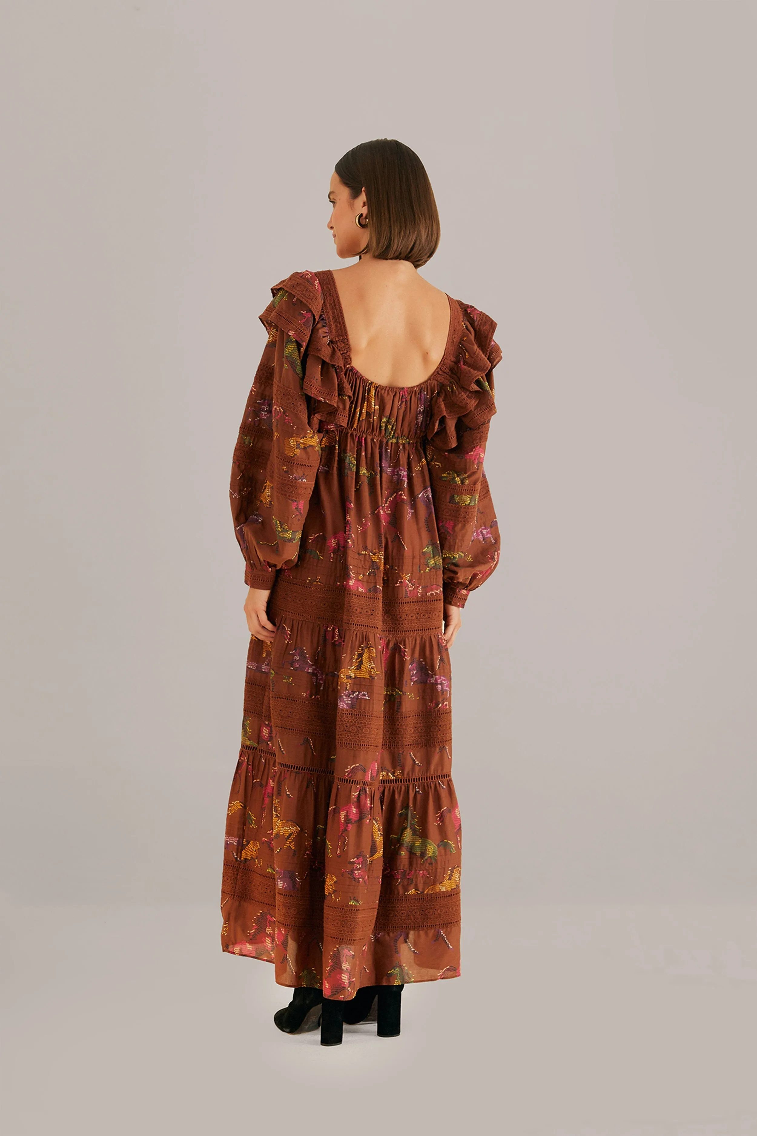 Brown Dotted Horses Maxi Dress Designed with a simple yet elegant cut this dress works for both casual and formal occasions