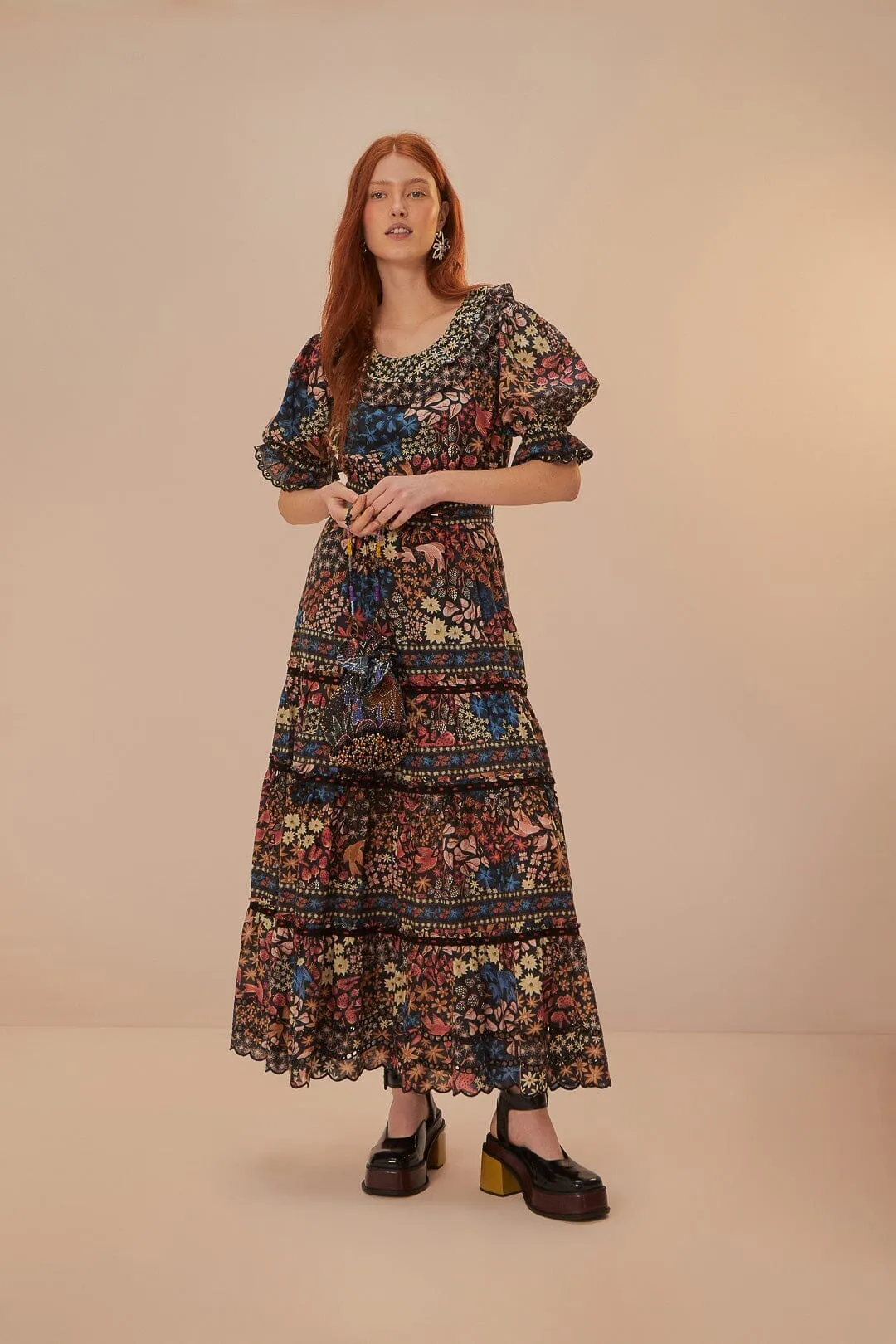 The simple silhouette of this dress makes it easy to style for both day and night wear Black Jujus Garden Maxi Dress