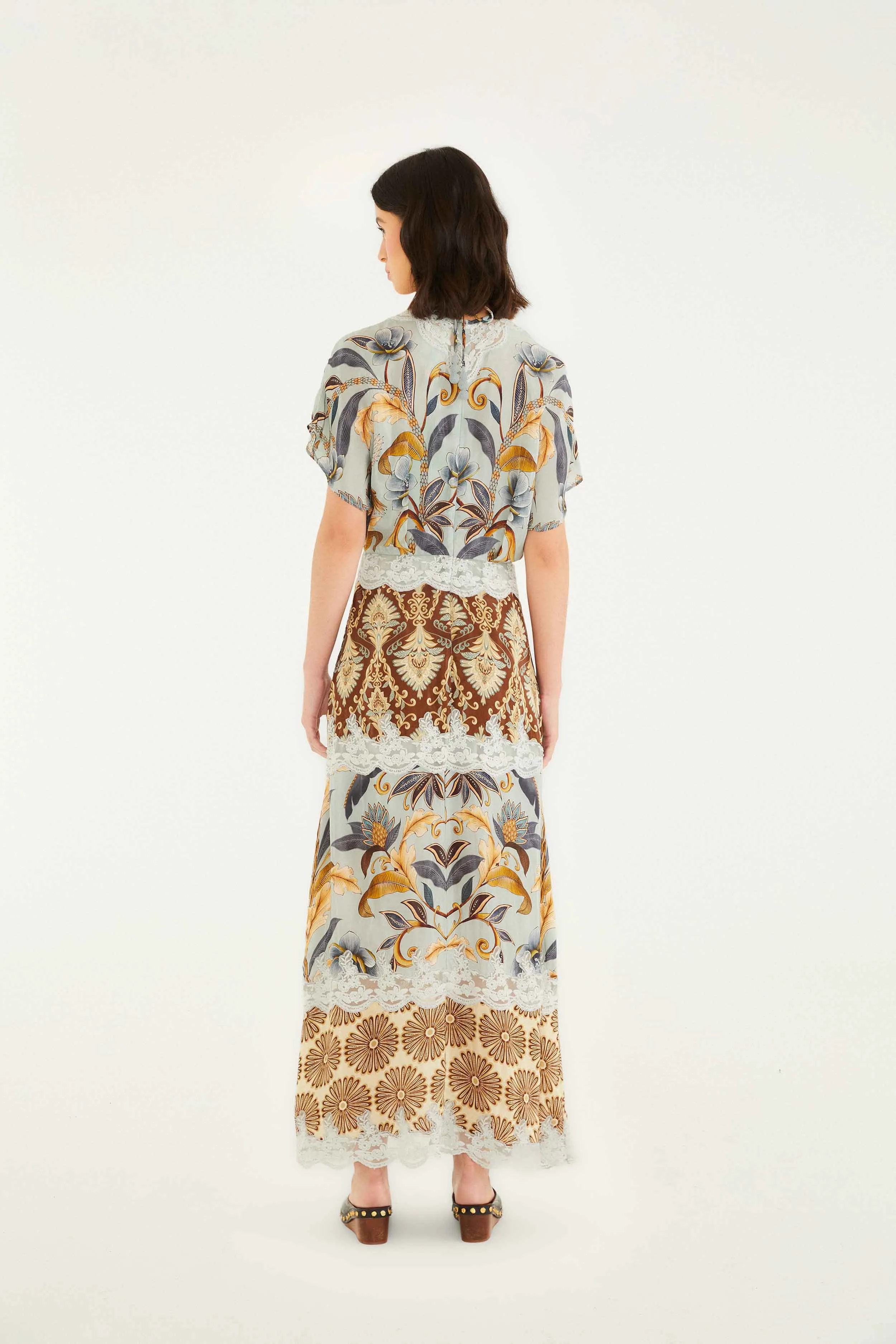 Mixed Snake Garden Maxi Dress The versatile nature of this maxi dress allows for a range of styling possibilities from casual to chic Amber Shine