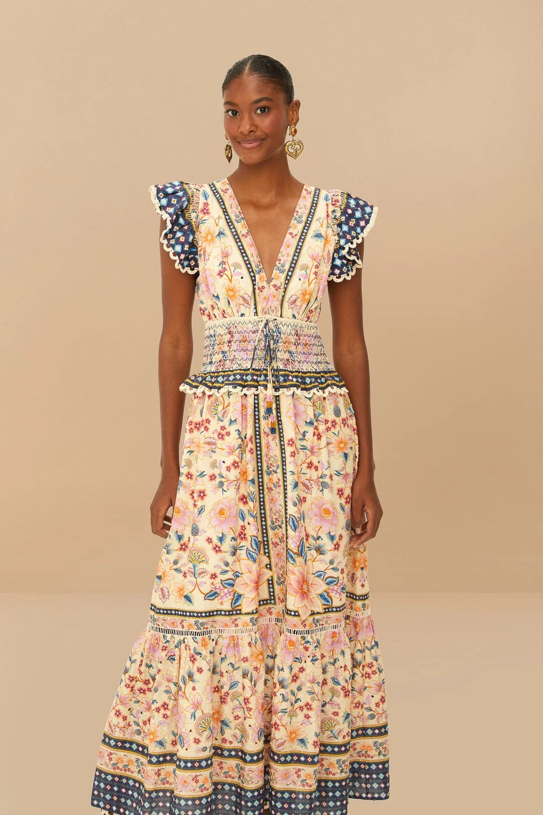 Cream Superbloom Tapestry Maxi Dress Elegant high-waist gown With its simple silhouette this maxi dress offers a flattering look for all body types