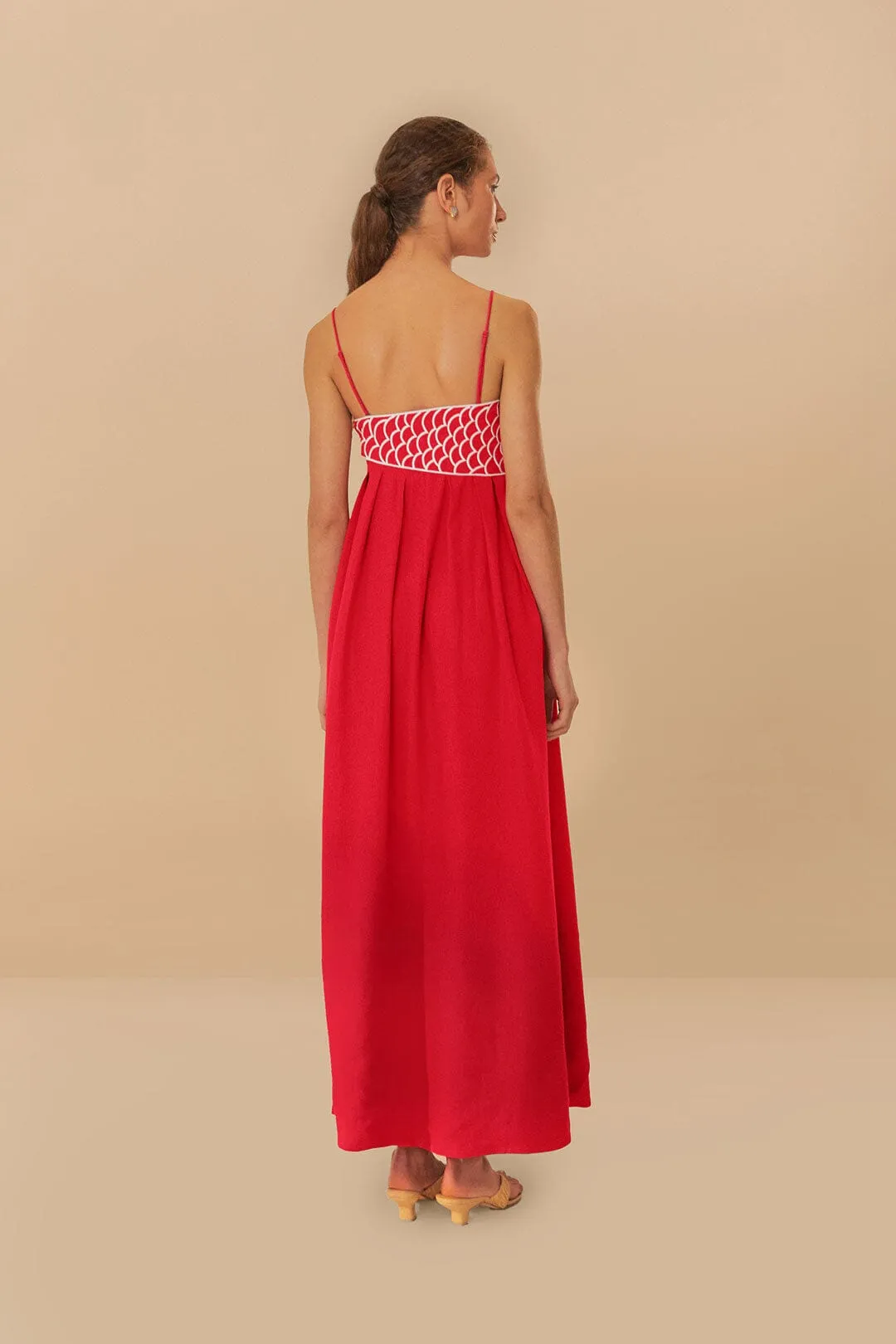 With a flattering fit and elegant design this dress is ideal for any special occasion Red Fish Top Maxi Dress