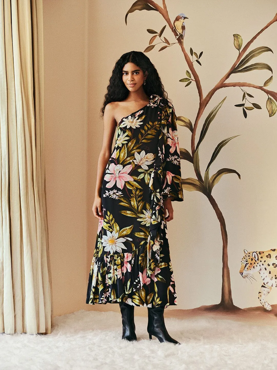 Whether worn for a casual day out or an evening event this maxi dress always looks chic Black Surreal Flowers One-Shoulder Maxi Dress