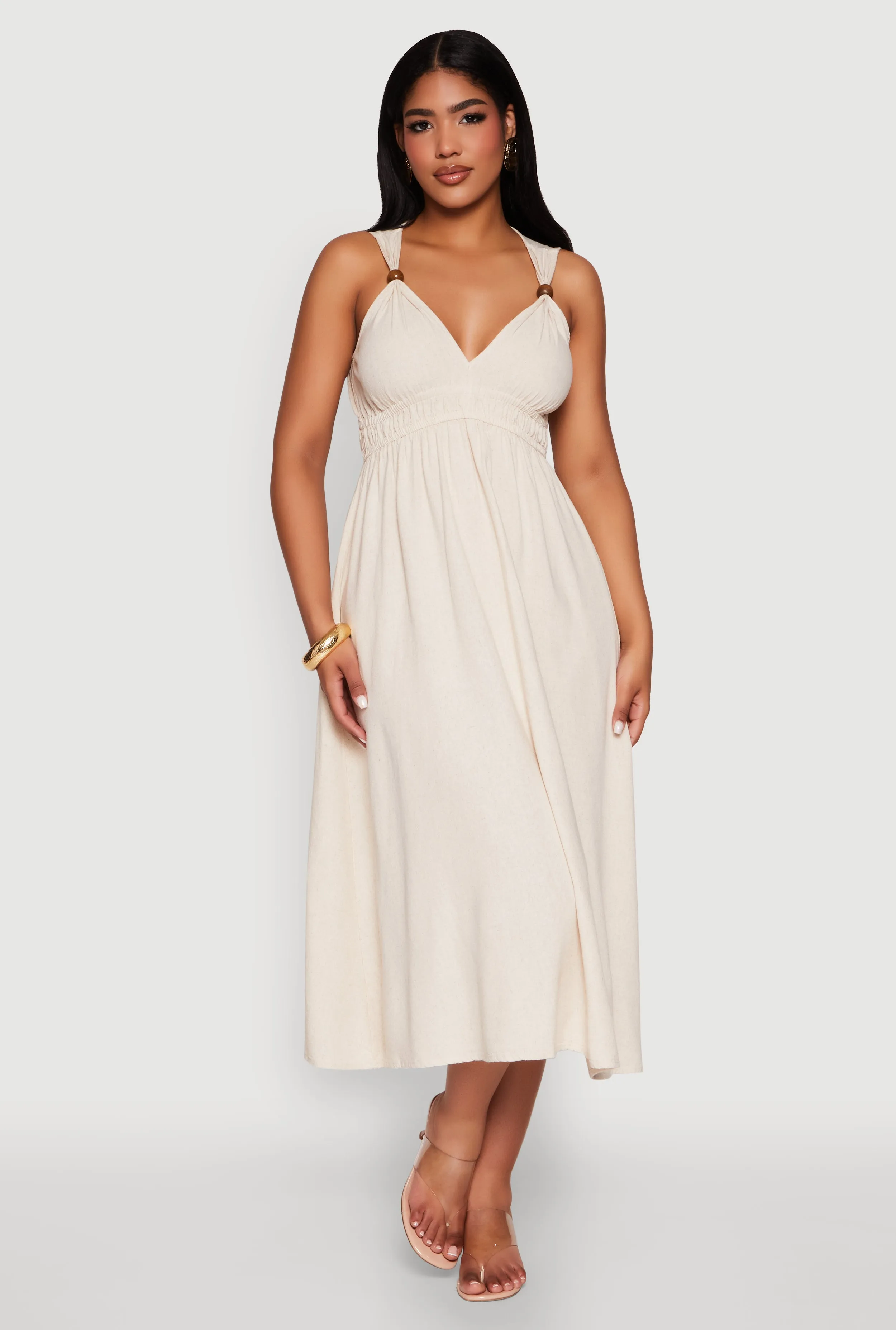 Perfect for layering with jackets or sweaters this maxi dress works for year-round wear Haute Monde Linen Wood Beaded Strap Sundress