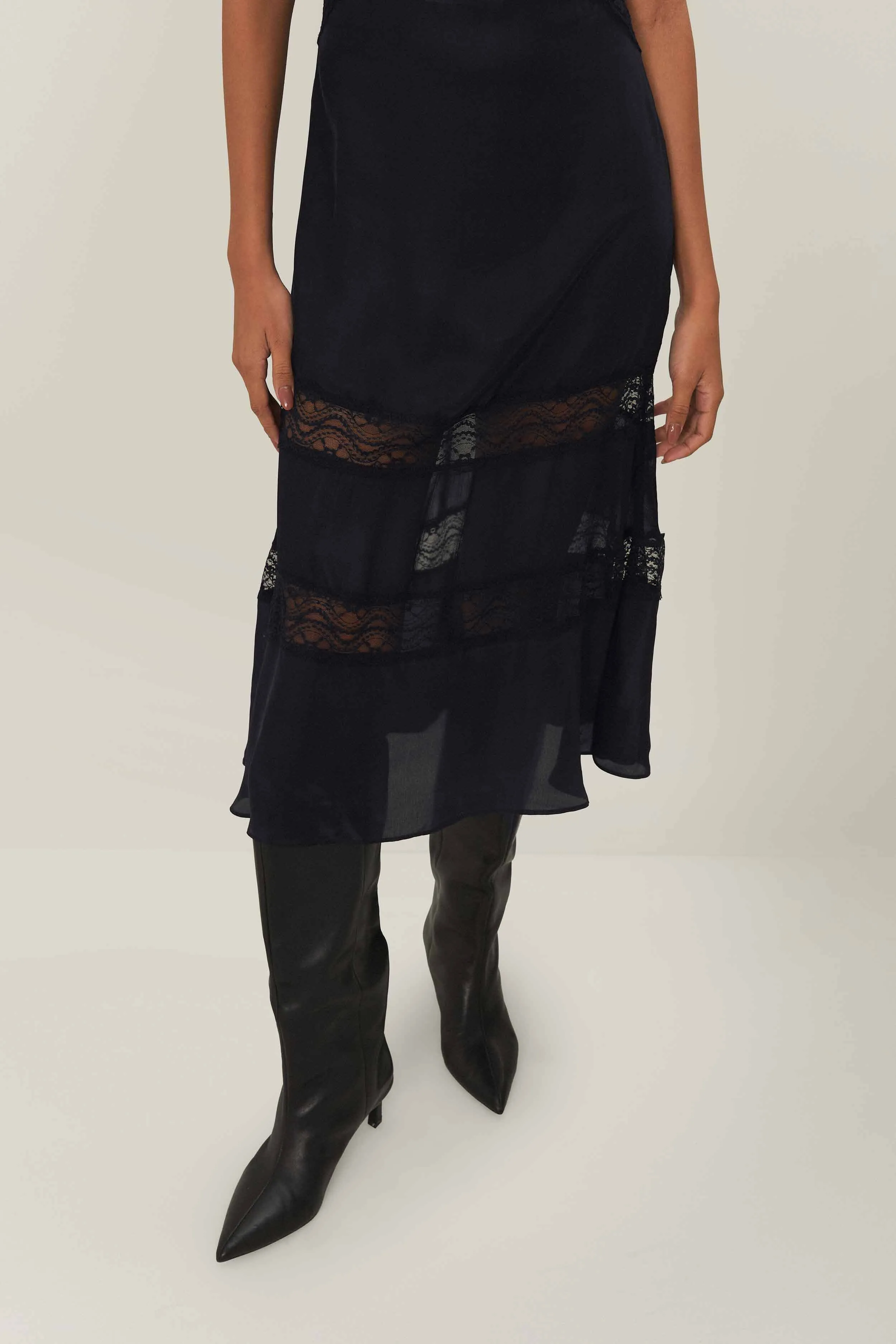 This dress is perfect for transitioning between seasons while still maintaining an elegant look Black Sleeveless Maxi Dress