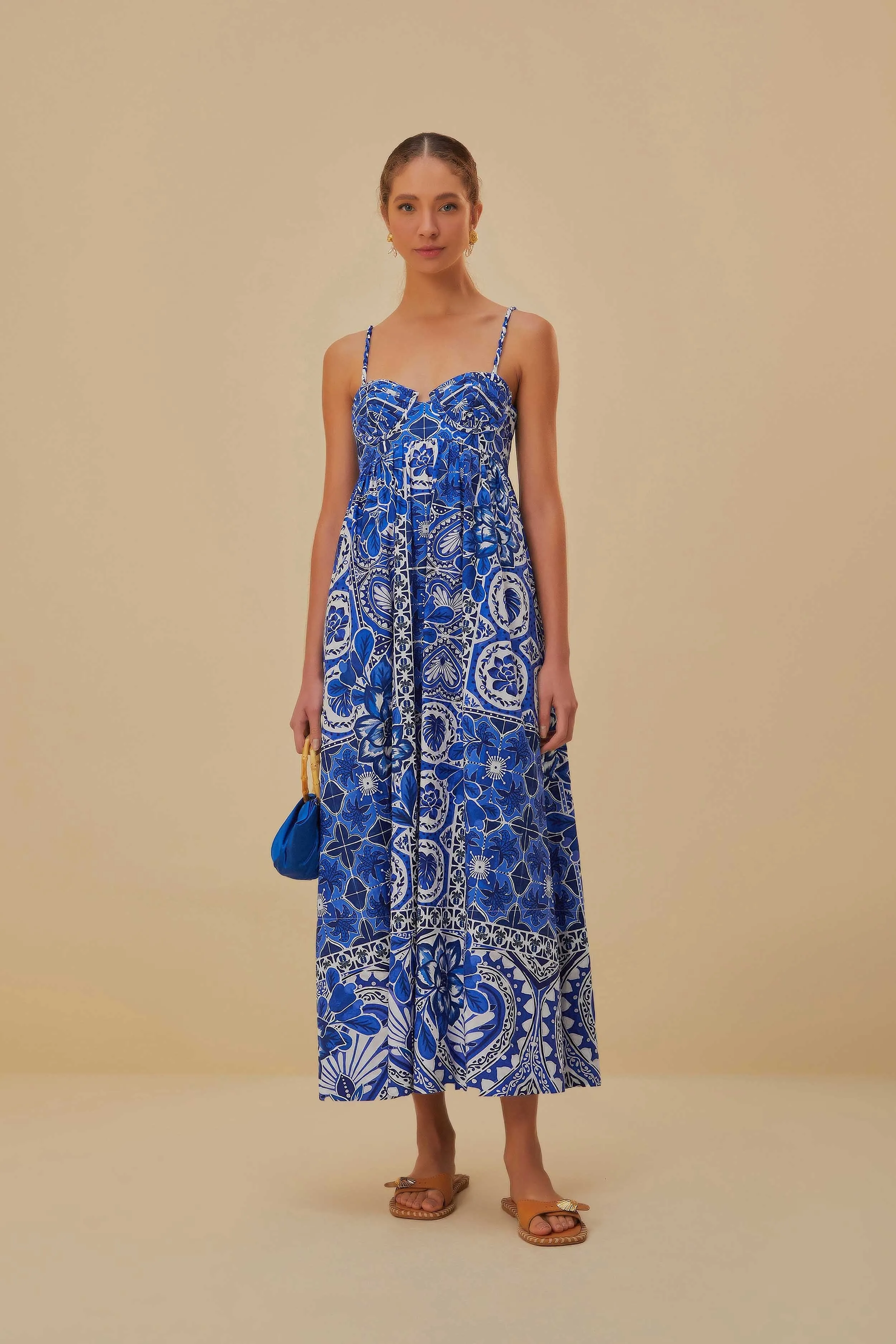 This dress is designed to be worn for a variety of occasions providing effortless style Vibrant colored maxi Blue Tile Dream Sleeveless Maxi Dress