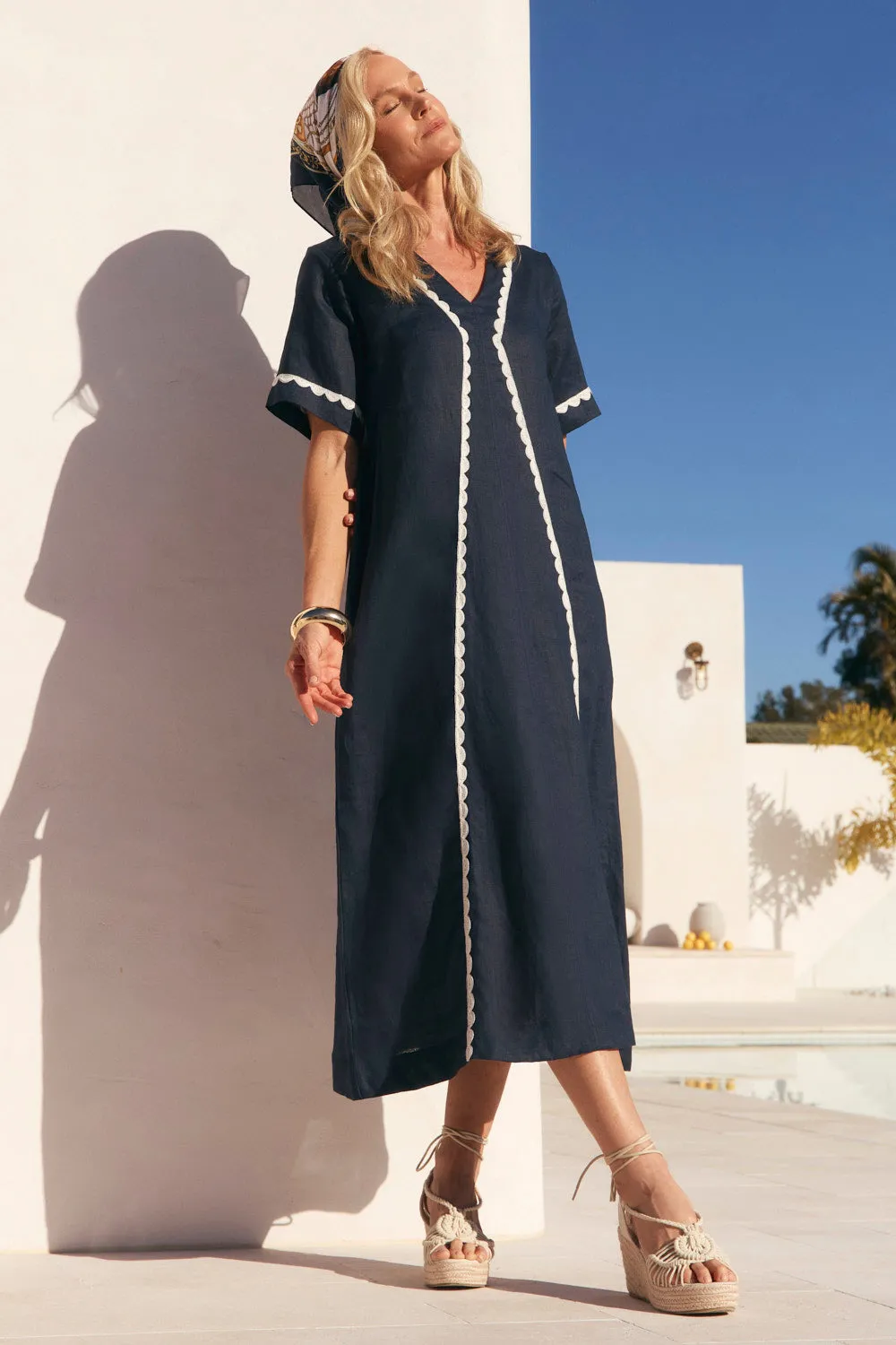 Tamara Linen V-Neck Dress in Beachside Retro Mode Perfect for a day out or a night on the town this dress offers endless styling possibilities