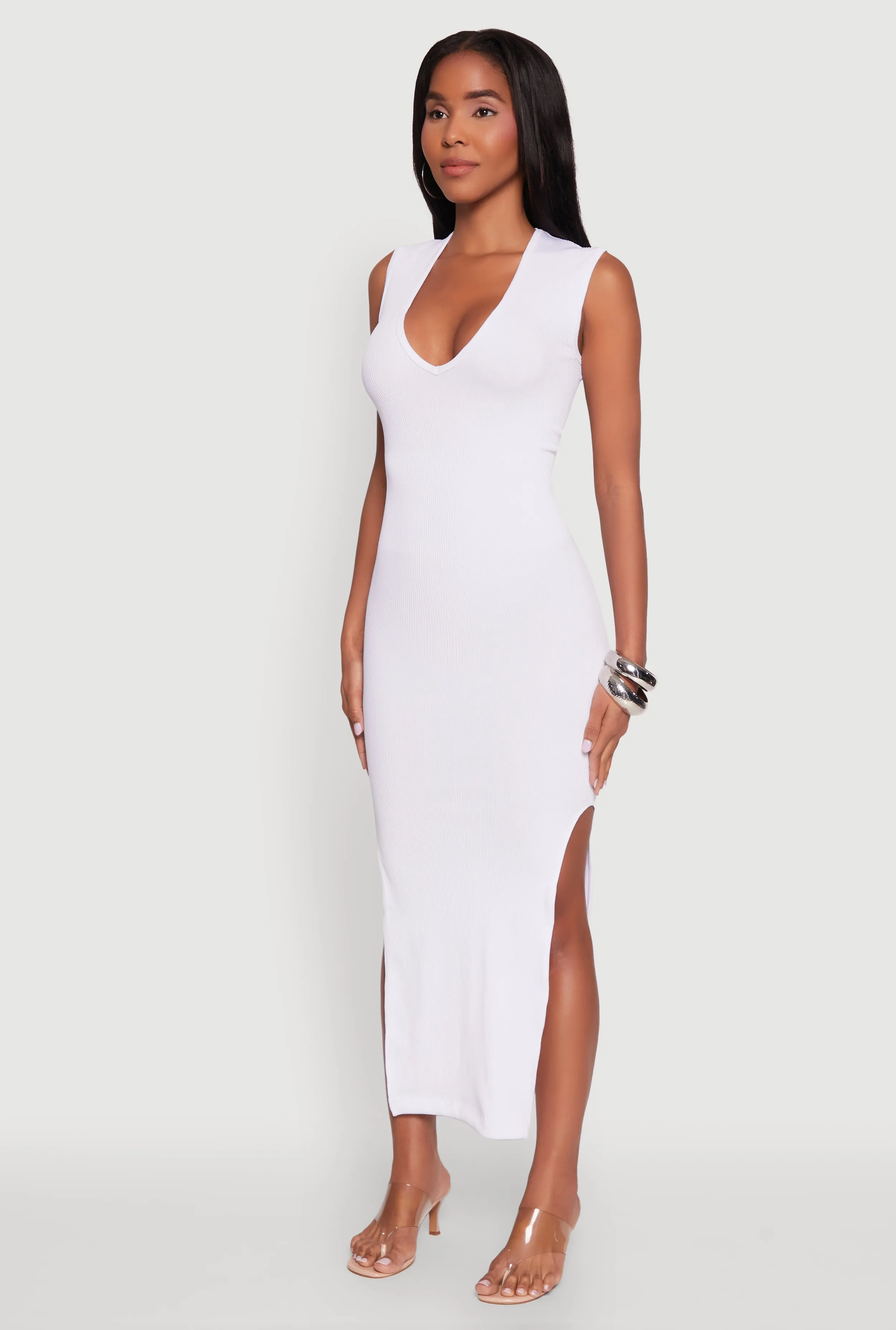 This maxi dress is perfect for creating a chic and polished look without trying too hard Trendy Rib Knit Plunge Neck Side Slit Maxi Dress