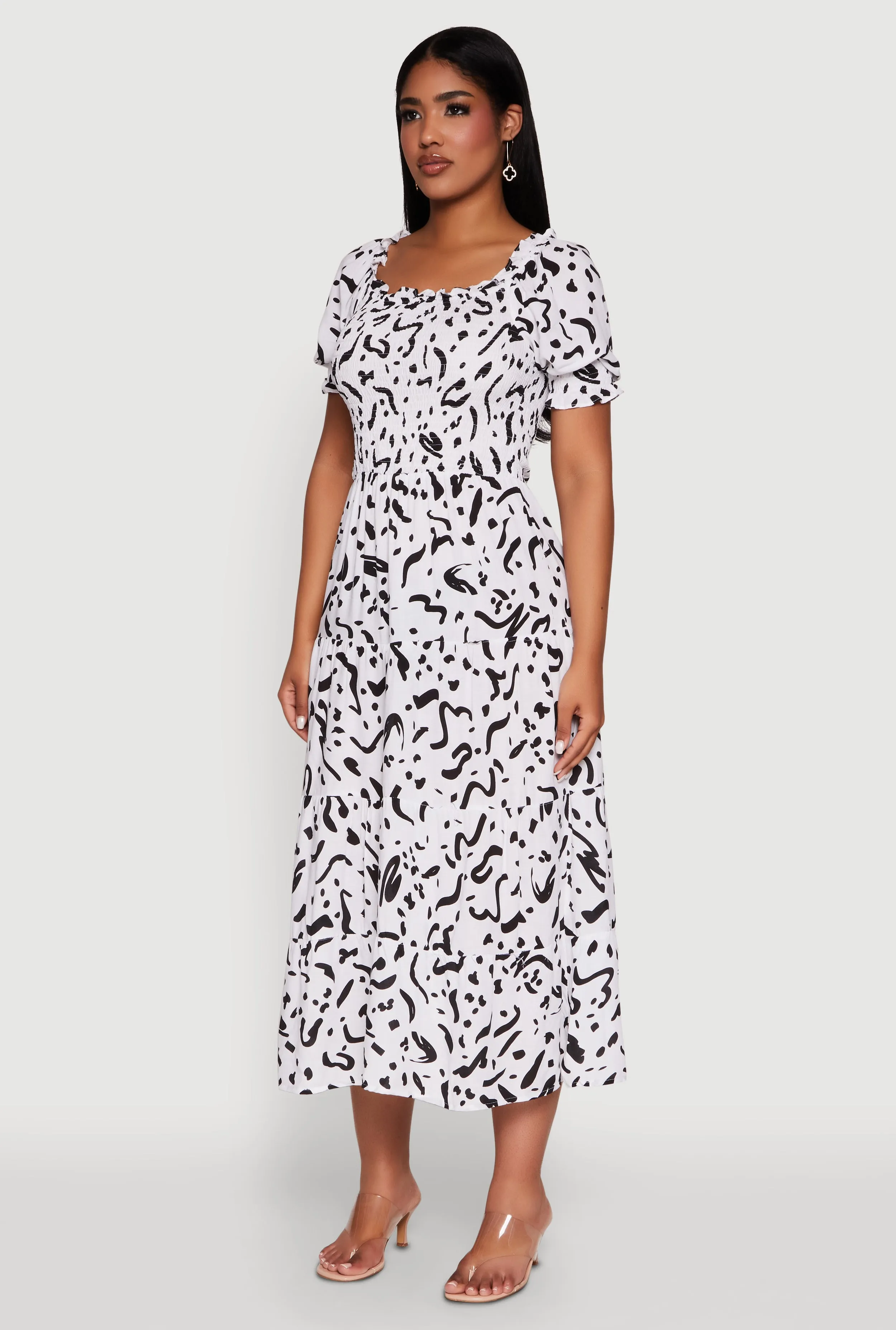 Patterned Smocked Maxi Peasant Dress With its elegant design this maxi dress can be styled for a variety of events from casual to formal