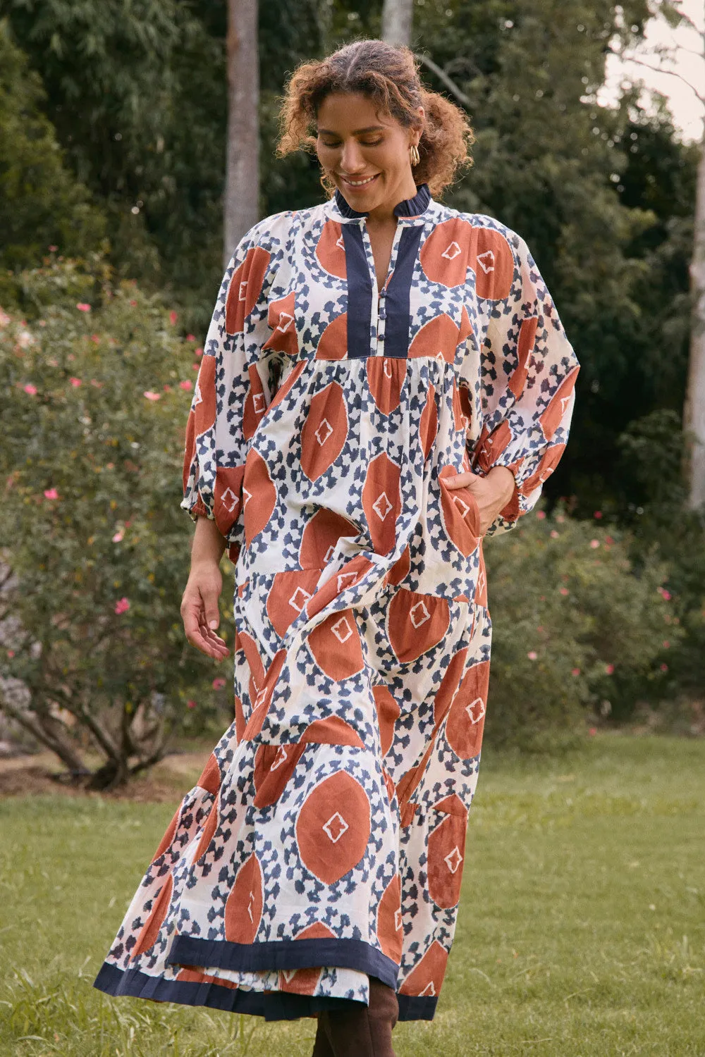 Mirabelle Frill Dress in Chestnut The long length of this dress provides ample coverage while remaining stylish This maxi dress offers an effortlessly chic look with a relaxed fit and elegant style