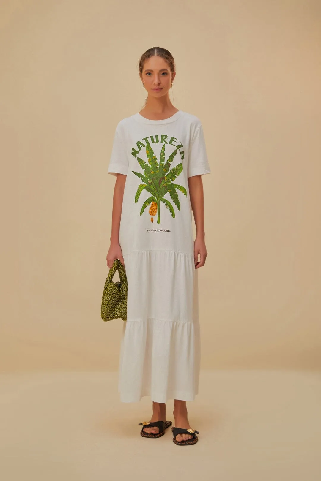Feather Glow This dress is the perfect addition to any wardrobe for those who value both style and comfort White Natureza Organic Cotton Maxi Dress