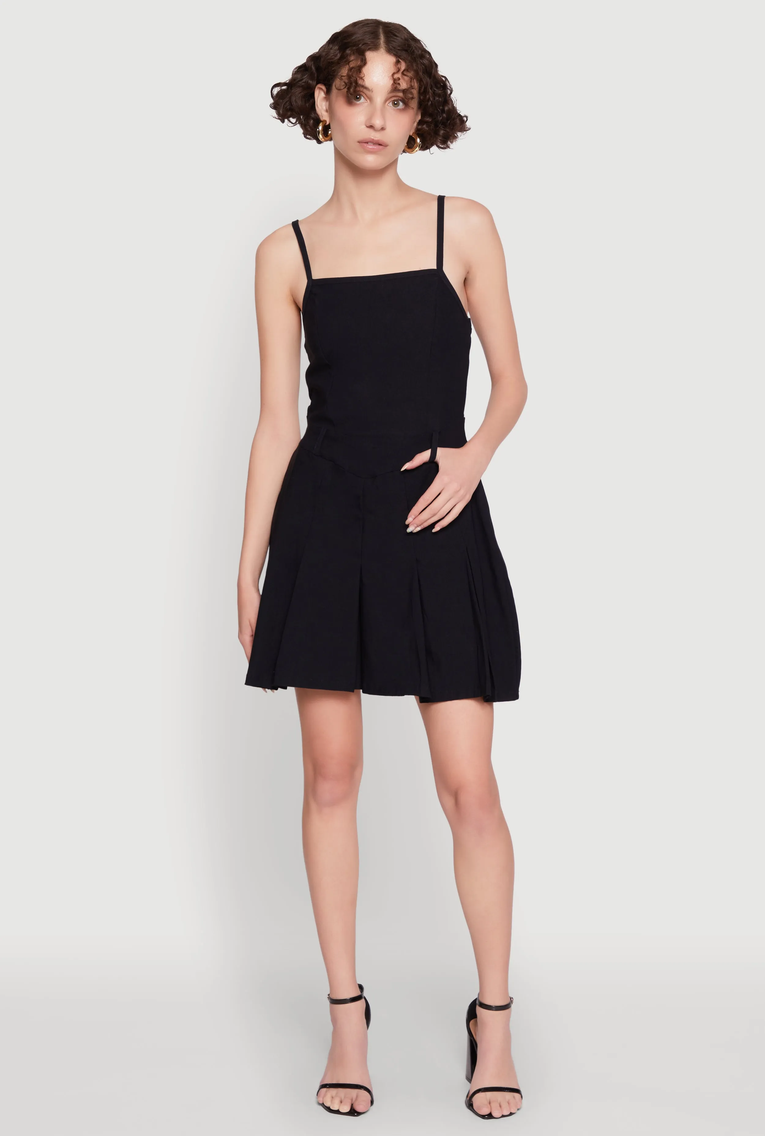 Sleek fit-and-flare style Street Spice Chic Sleeveless Pleated Skater Dress