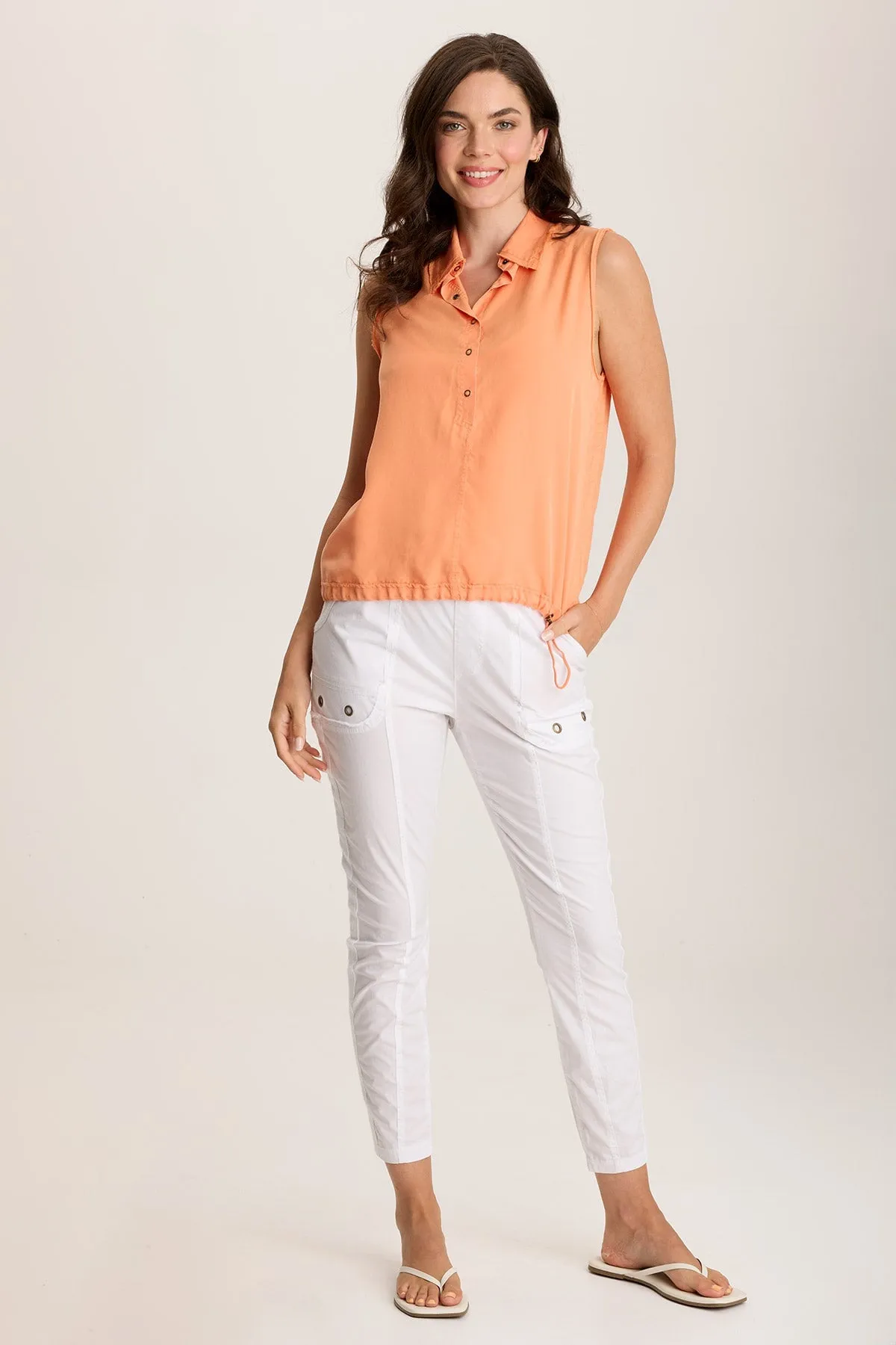 Rein Sleeveless Polo with Snap Front & Cinched Hem EcoFriendlyProduction Story Mood