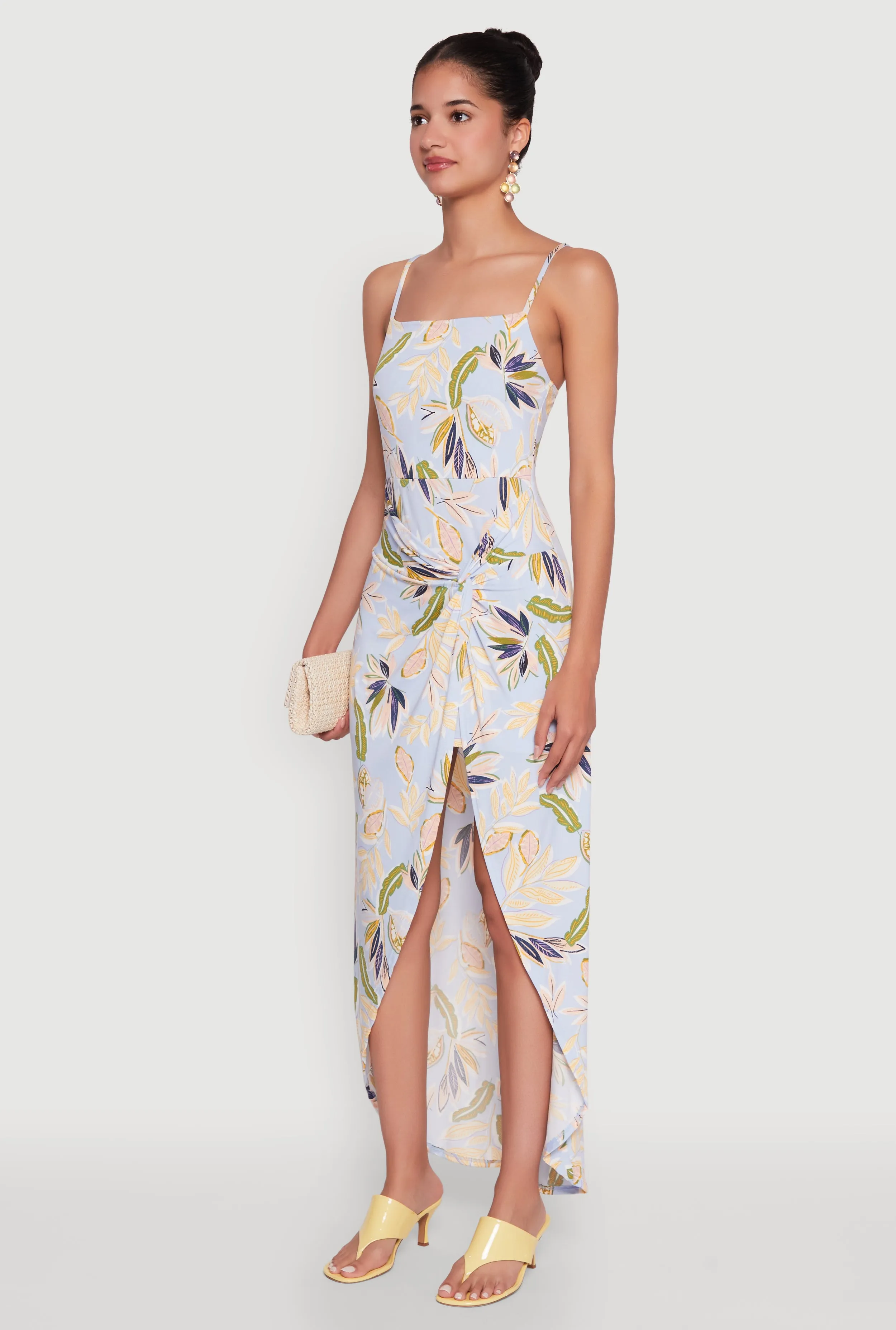 The simple yet stylish design of this maxi dress makes it an ideal choice for any occasion Haute Monde Sleeveless Square Neck Floral High Low Maxi Dress