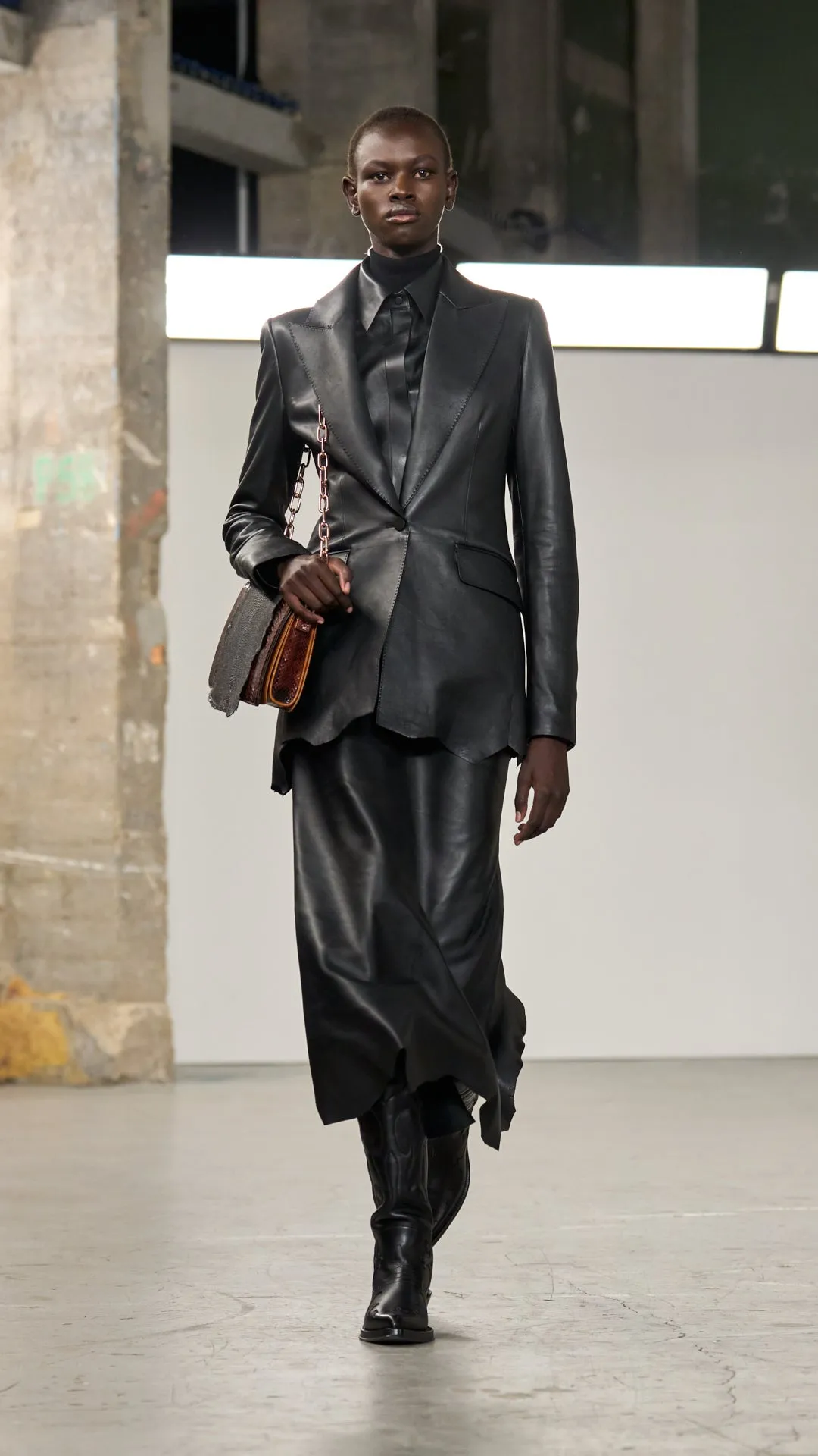Edwardo Raw Cut Midi Skirt in Black Soft Leather Future Glow WrinkleFreeFabric
