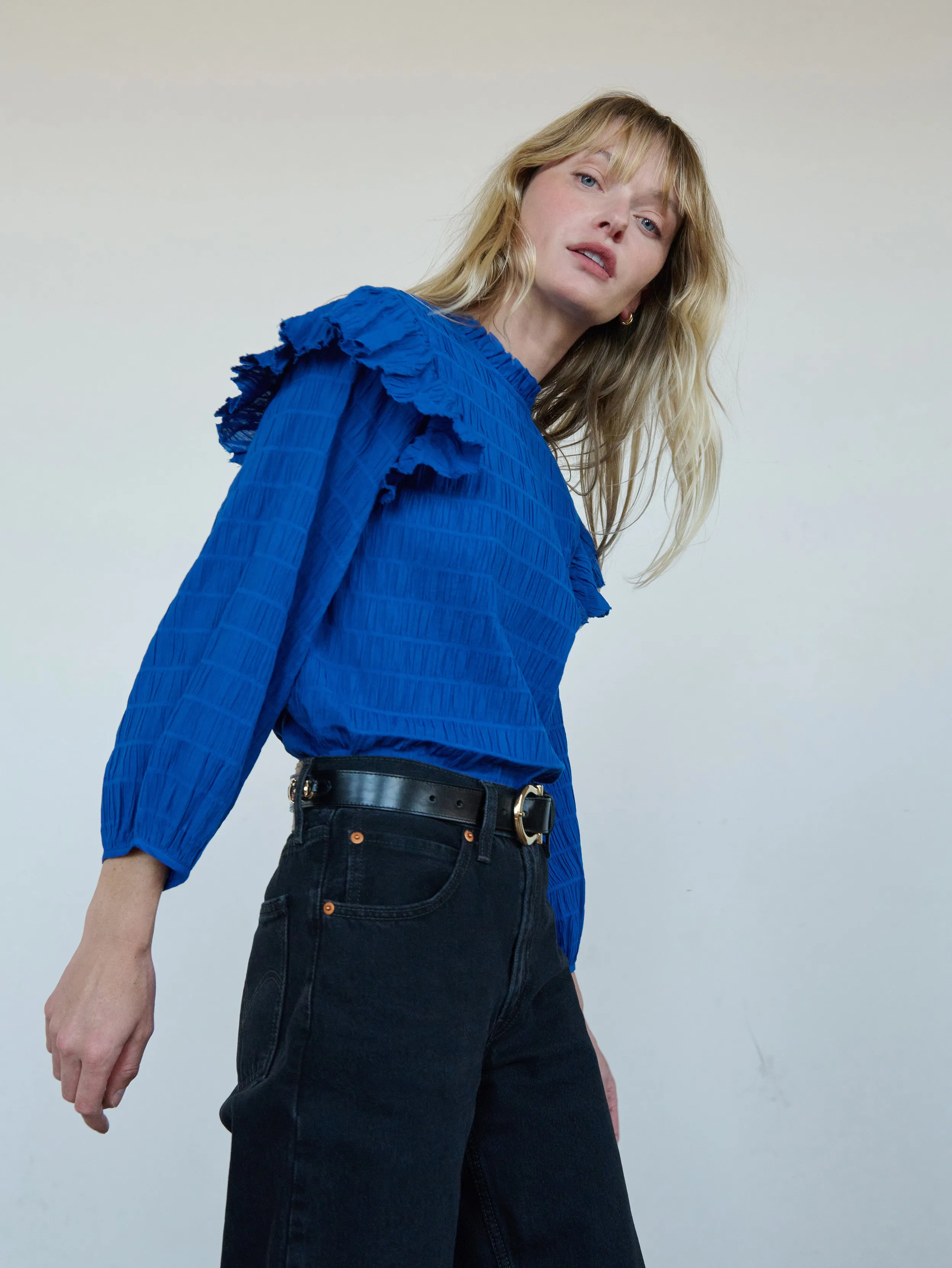 AbrasionResistant Material Aria Ruffle Top