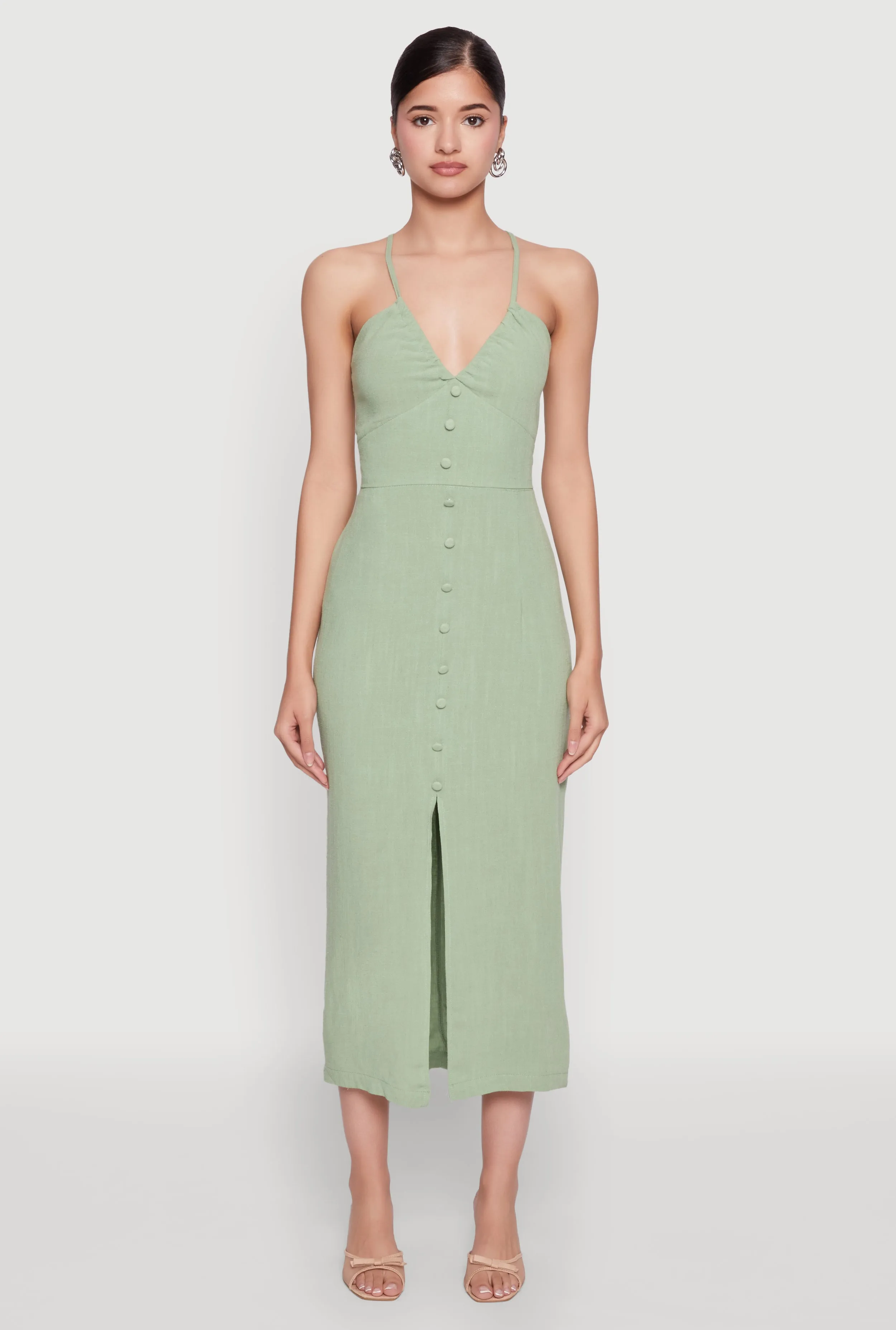 Moonlit Shore This dress offers a flattering shape that can easily be accessorized for a variety of looks Open Tie Back Button Front Maxi Dress