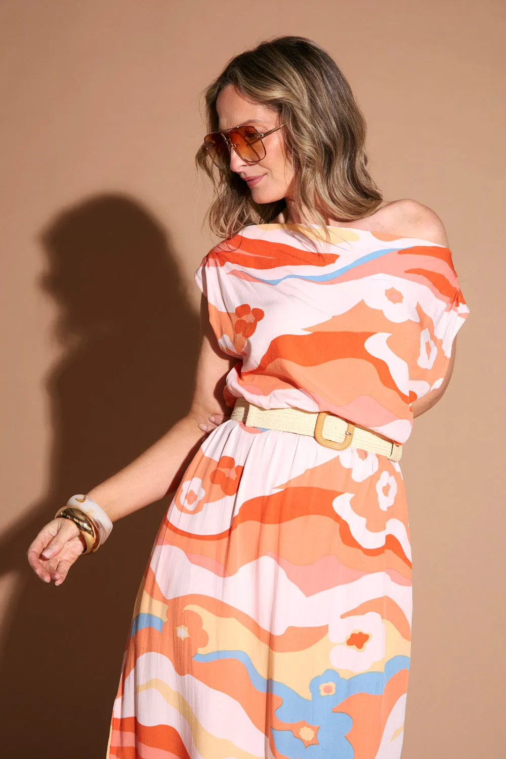 Alice Drop Shoulder Maxi Dress in Solene Orange This dress is the perfect addition to any wardrobe for those who value both style and comfort