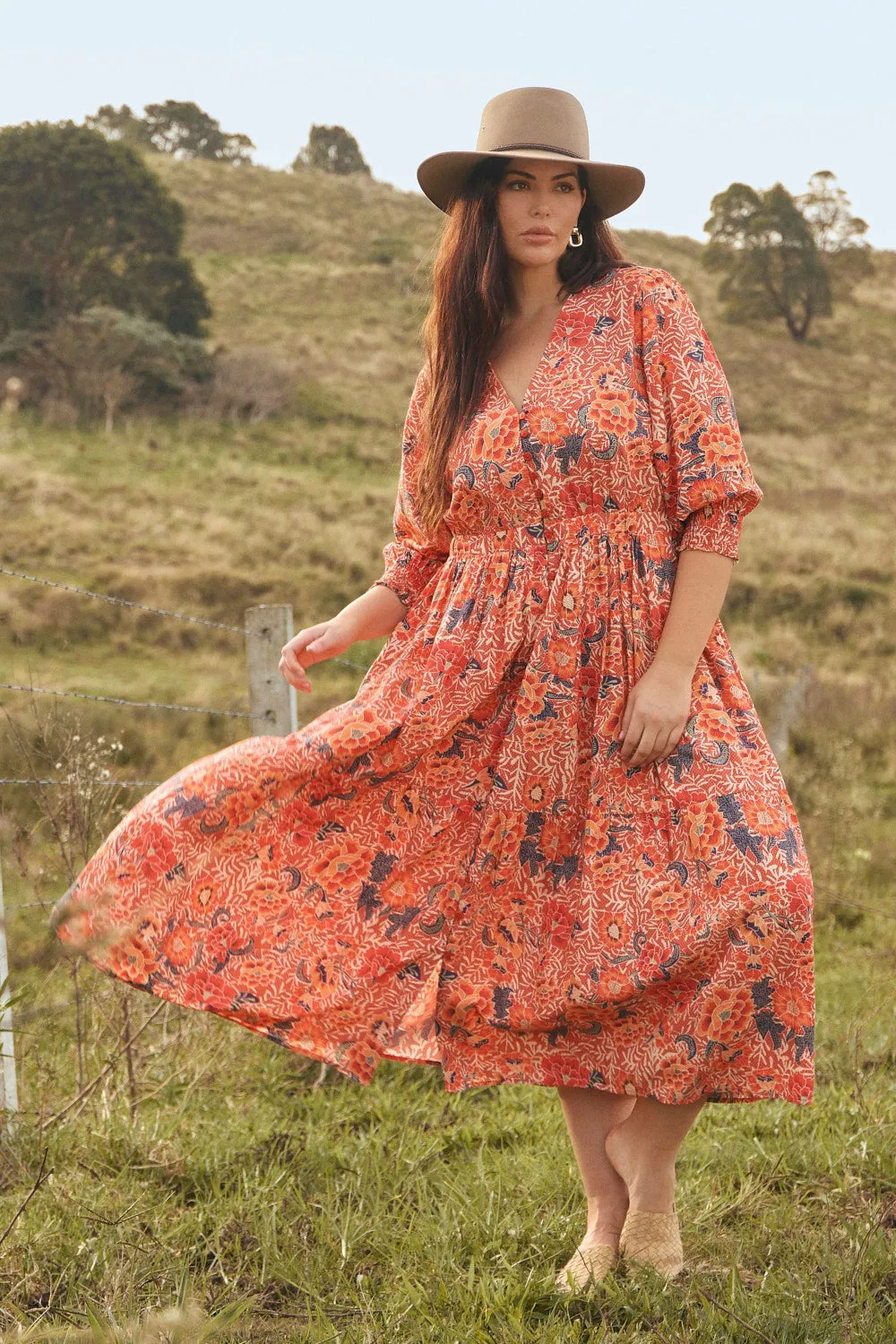 Savelle Long Sleeve Dress in Crimson Haze The long length of this dress creates a graceful appearance that is perfect for any occasion