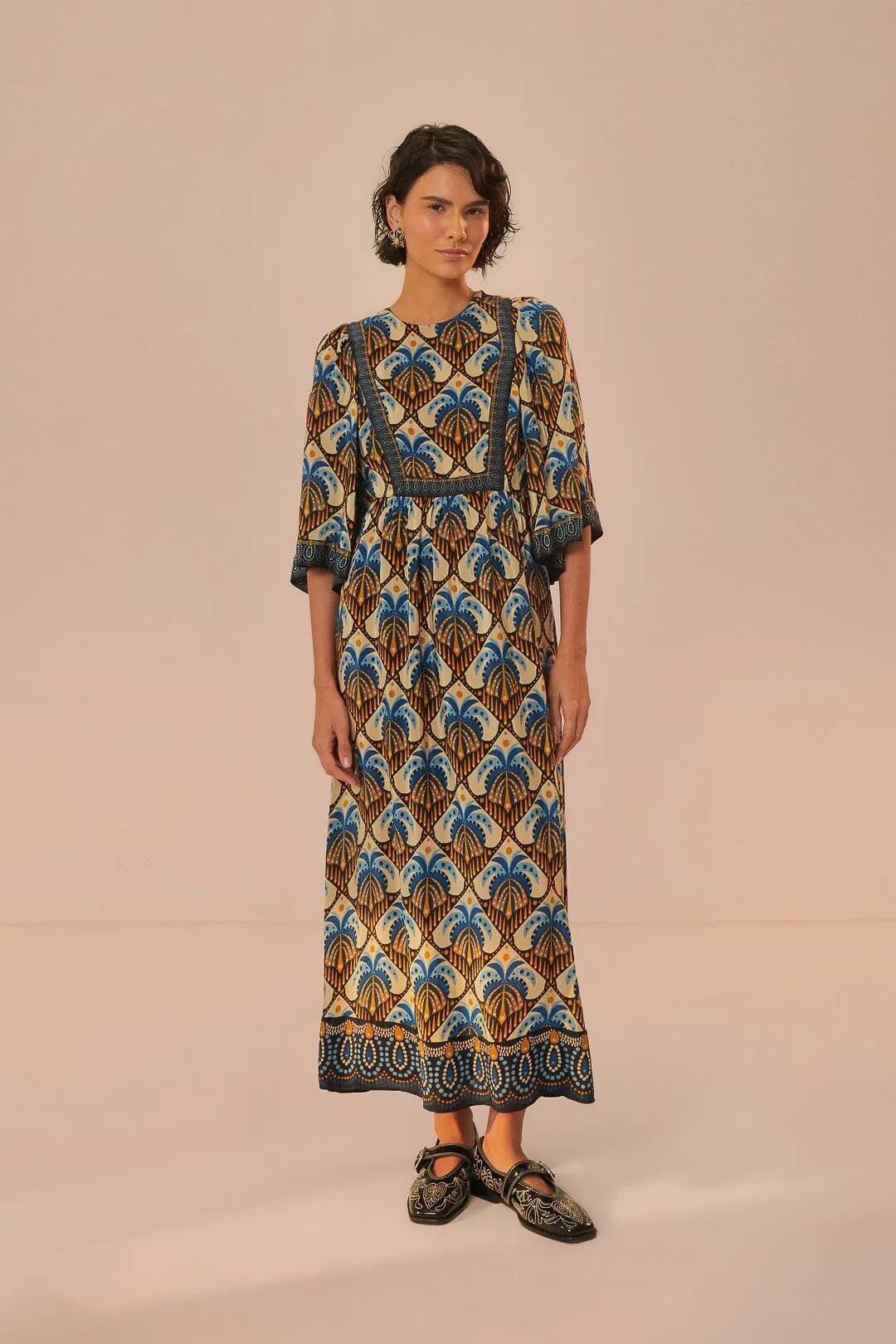 The versatile nature of this maxi dress allows for a range of styling possibilities from casual to chic Beige Cocopalm Maxi Dress