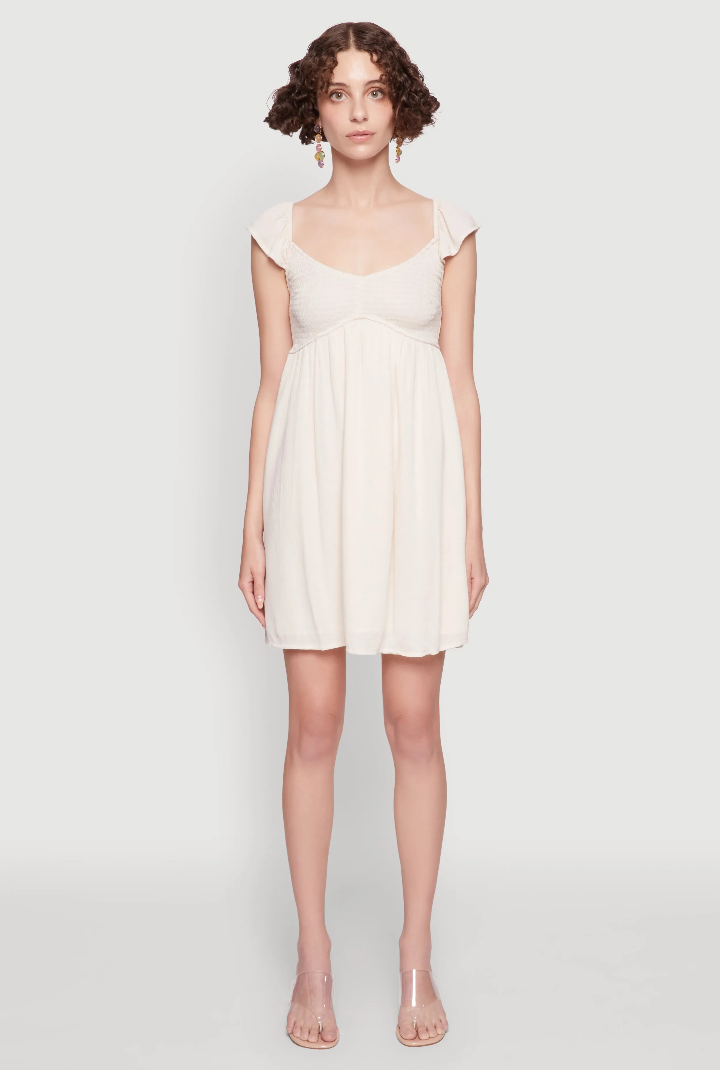 Smocked Flutter Sleeve Empire Waist Mini Dress Show Glow
