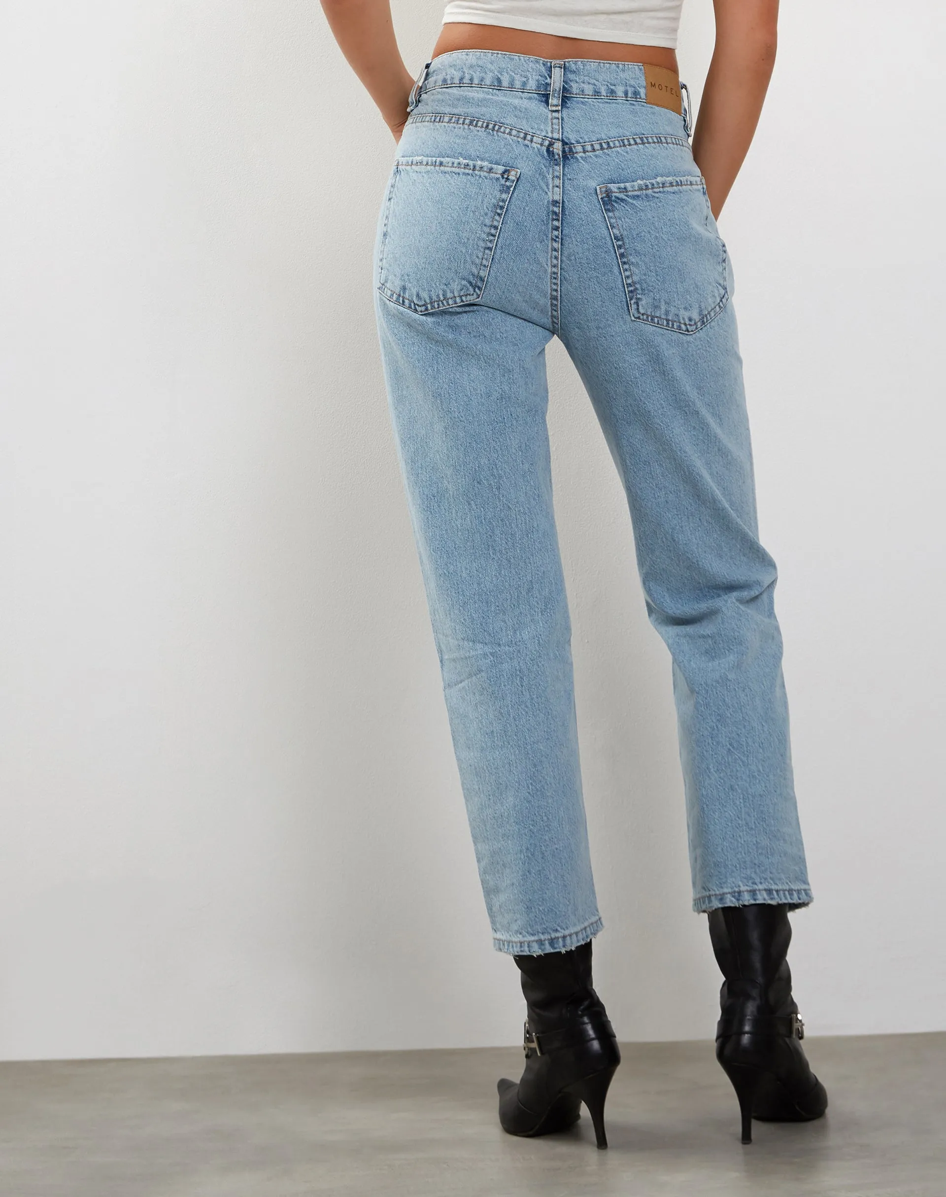 CompressionEnhanced Mid Rise Straight Leg Jeans in Bleach Denim