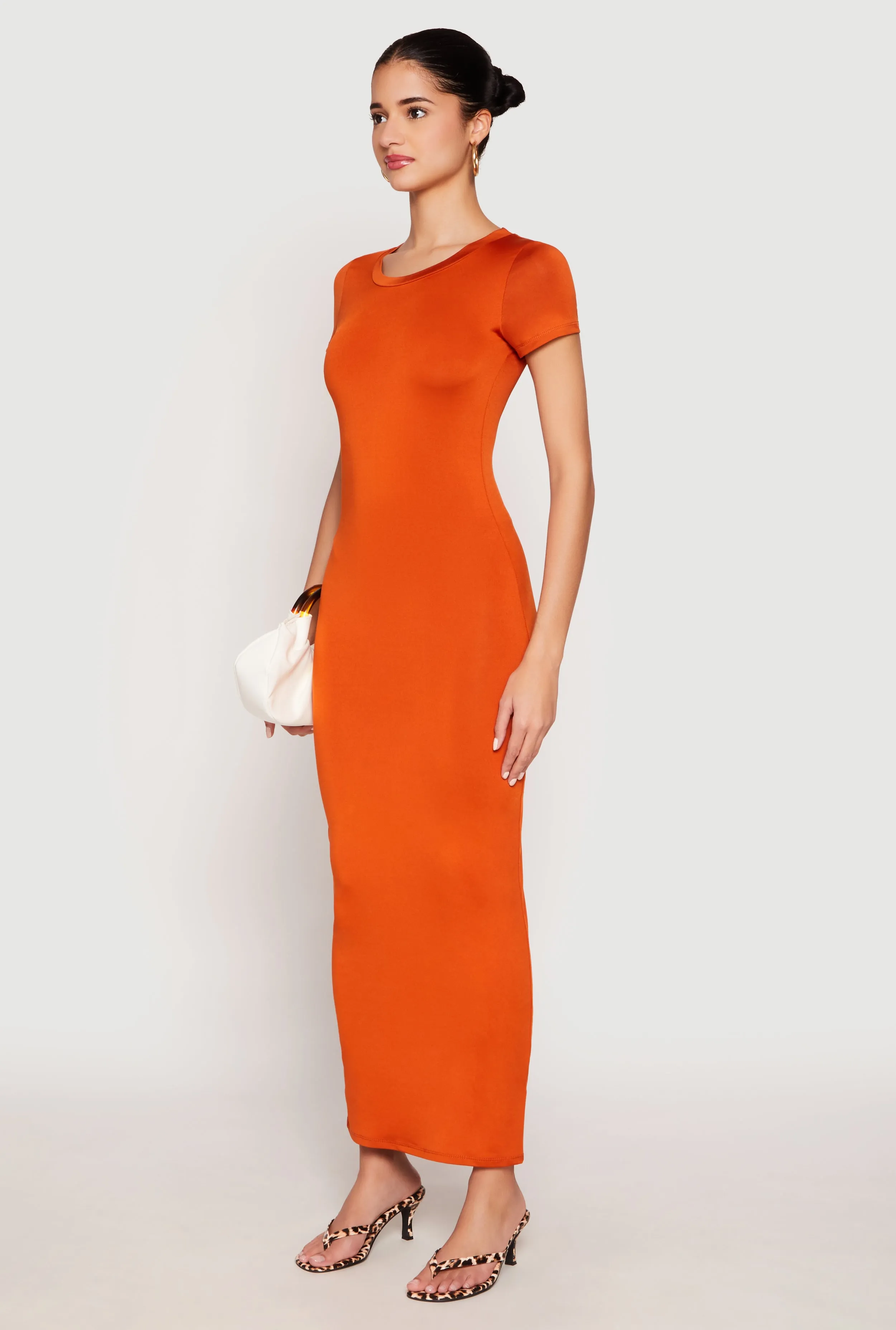 The lightweight fabric of this dress ensures comfort throughout the day without compromising style Short Sleeve Slit Back Maxi Dress