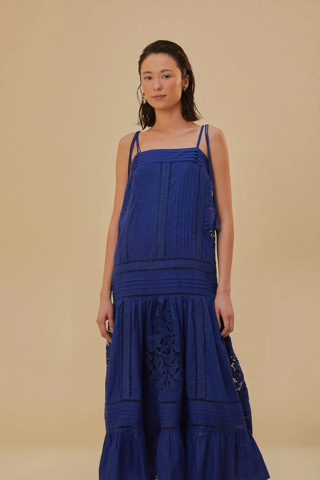 This dress offers a flattering shape that can easily be accessorized for a variety of looks Blue Lace Sleeveless Maxi Dress