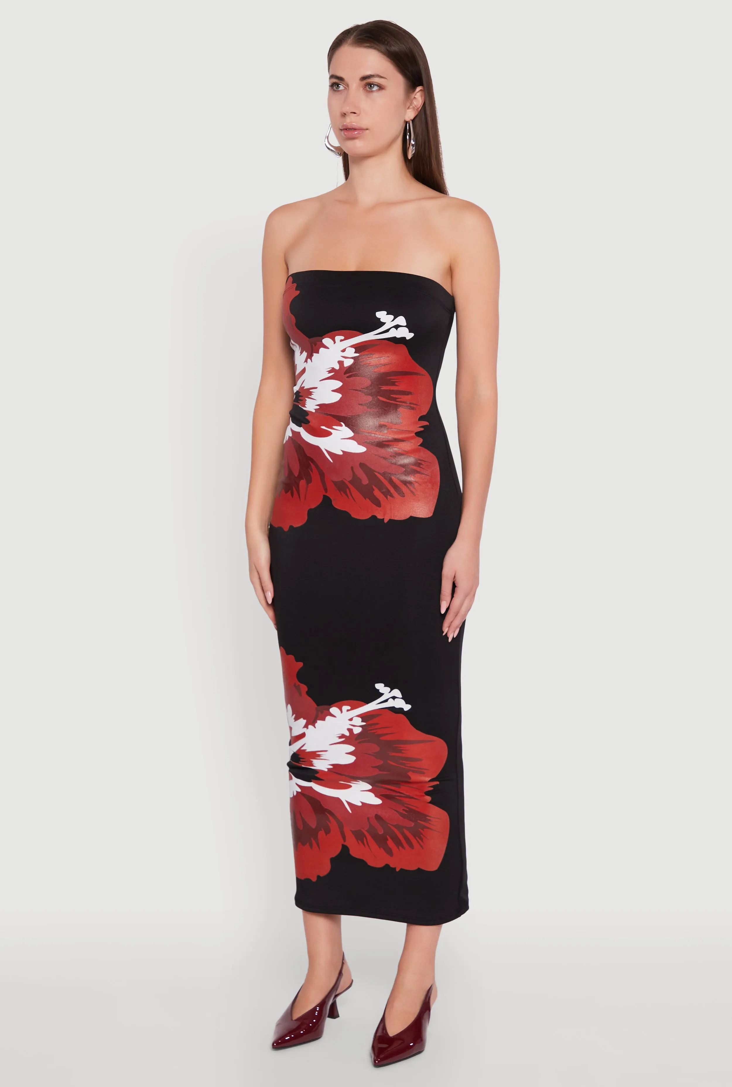 The sleek lines of this maxi dress create a flattering and elegant look for any event Dye Glow Floral Graphic Tube Maxi Dress