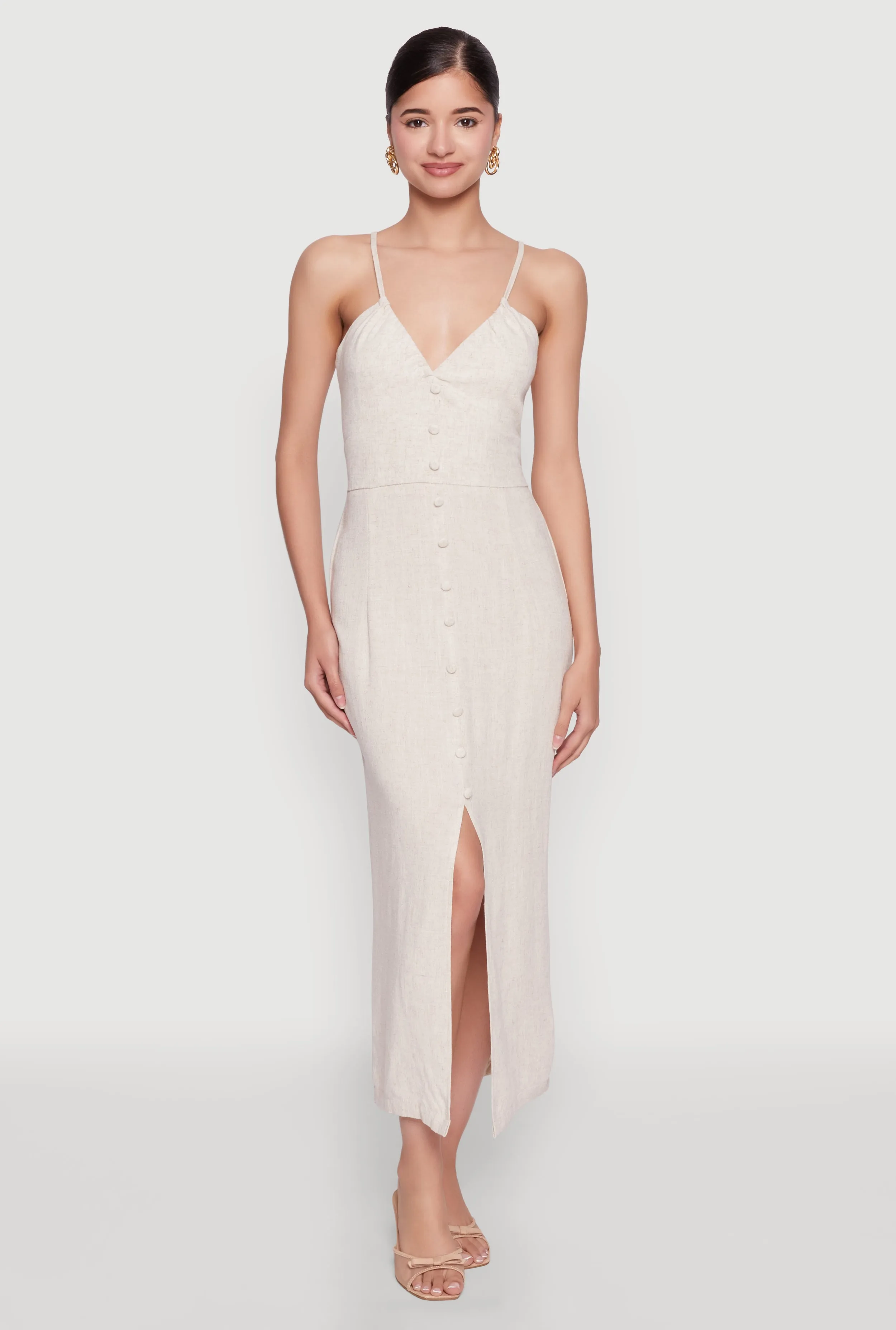 Open Tie Back Button Front Maxi Dress This maxi dress can be worn with a variety of shoes and accessories to create a unique look