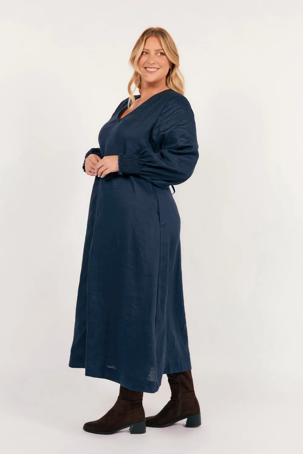 Tamara Long Sleeve Linen Dress in Navy Timeless and classic maxi This dress is the perfect addition to any wardrobe for those who value both style and comfort