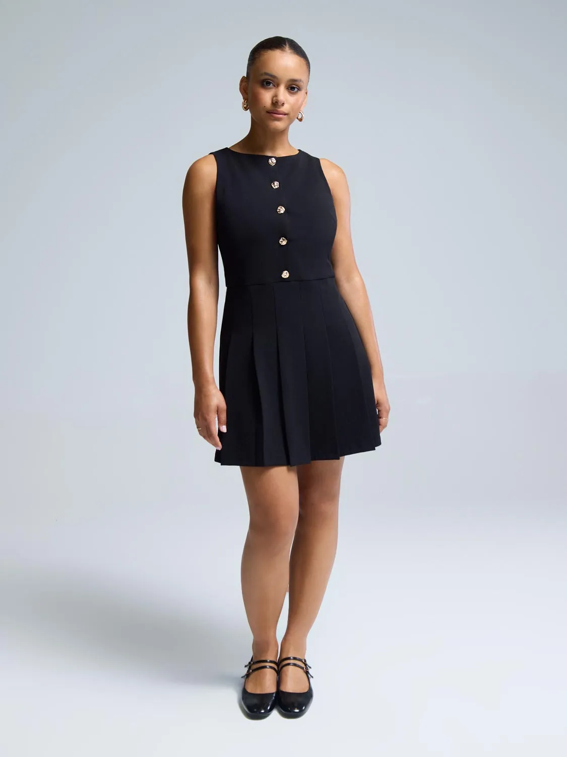 Spice Core Sleeveless Mini Dress With Pleated Skirt