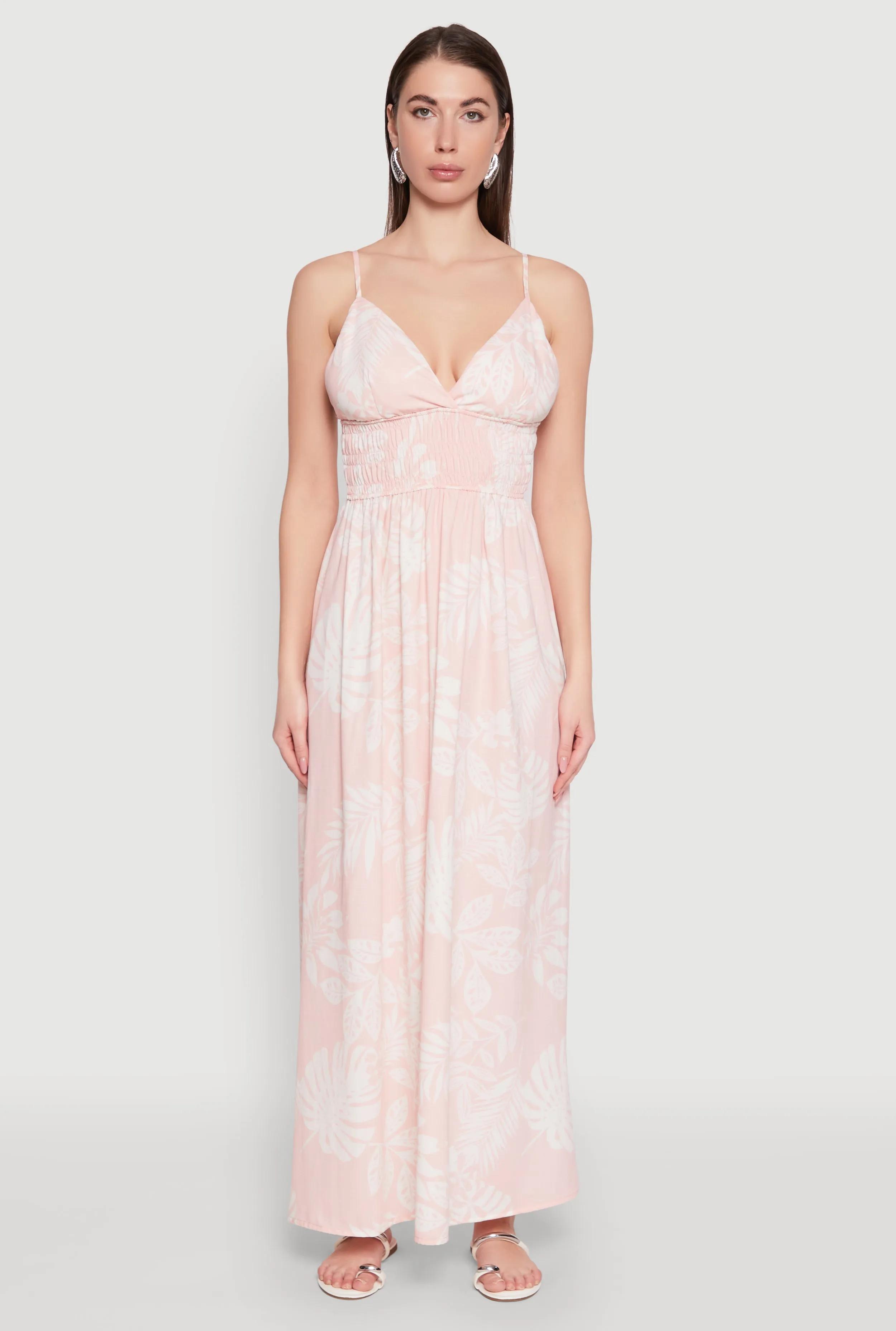 Haute Monde Leaf Print Smocked Maxi Dress The flattering silhouette of this dress enhances your figure without compromising comfort