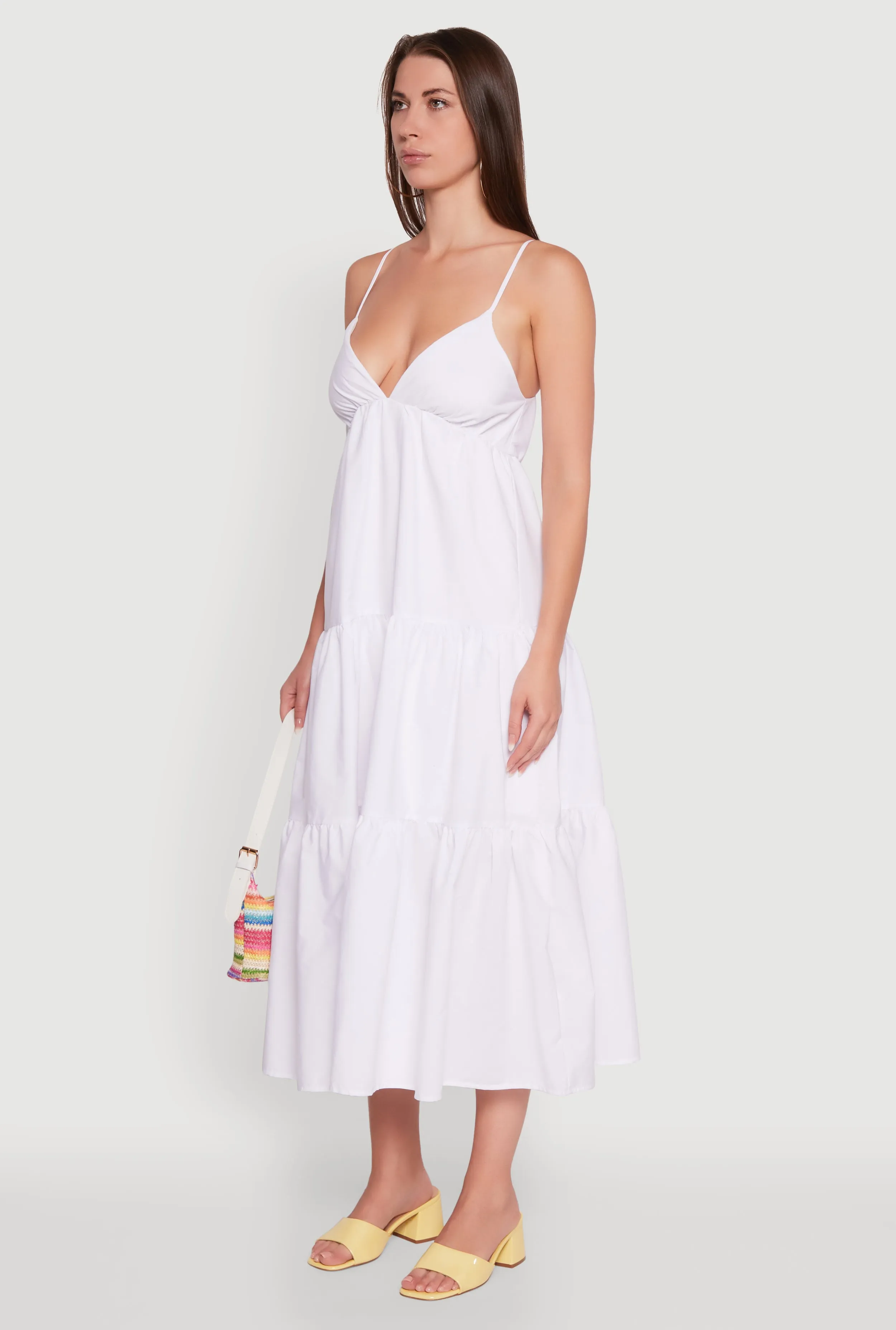 This maxi dress creates an elegant silhouette without sacrificing comfort Trendy V-Neck Sleeveless Tiered Maxi Dress
