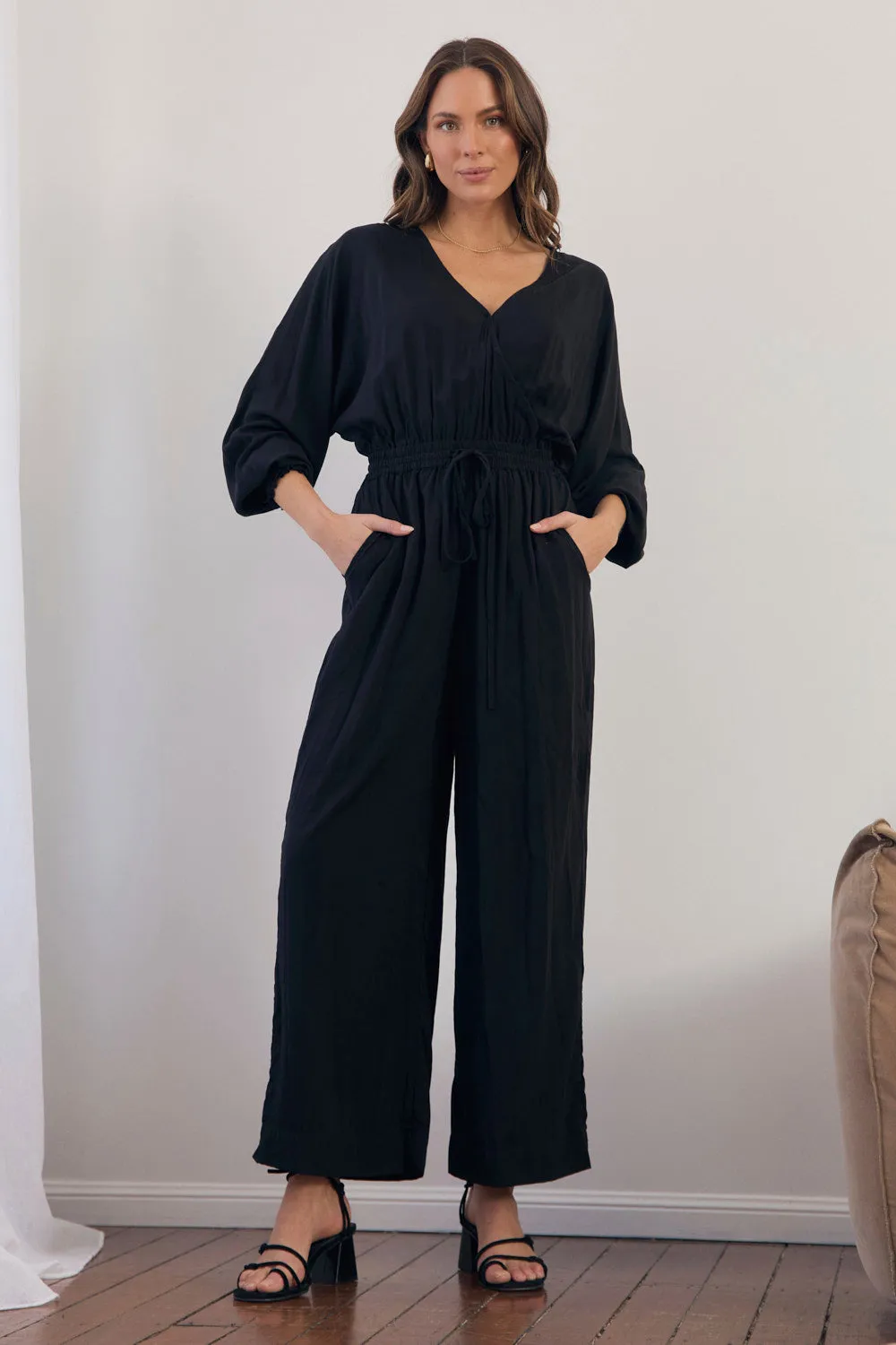 Lucette Long Sleeve Jumpsuit in Black Clay Glow Gorgeous floor-length style