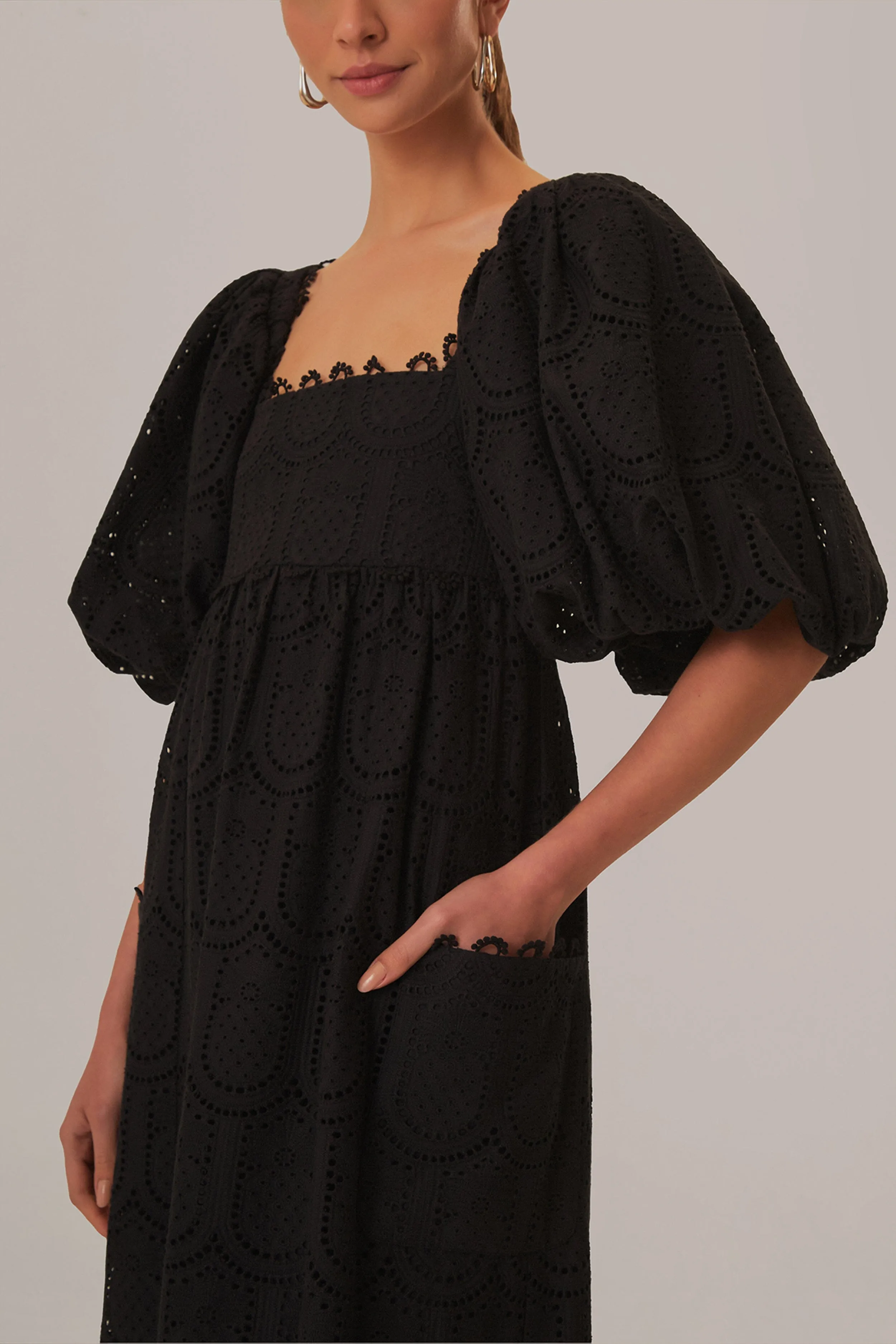 Black Pineapple Eyelet Maxi Dress This maxi dress offers an effortlessly chic look with a relaxed fit and elegant style