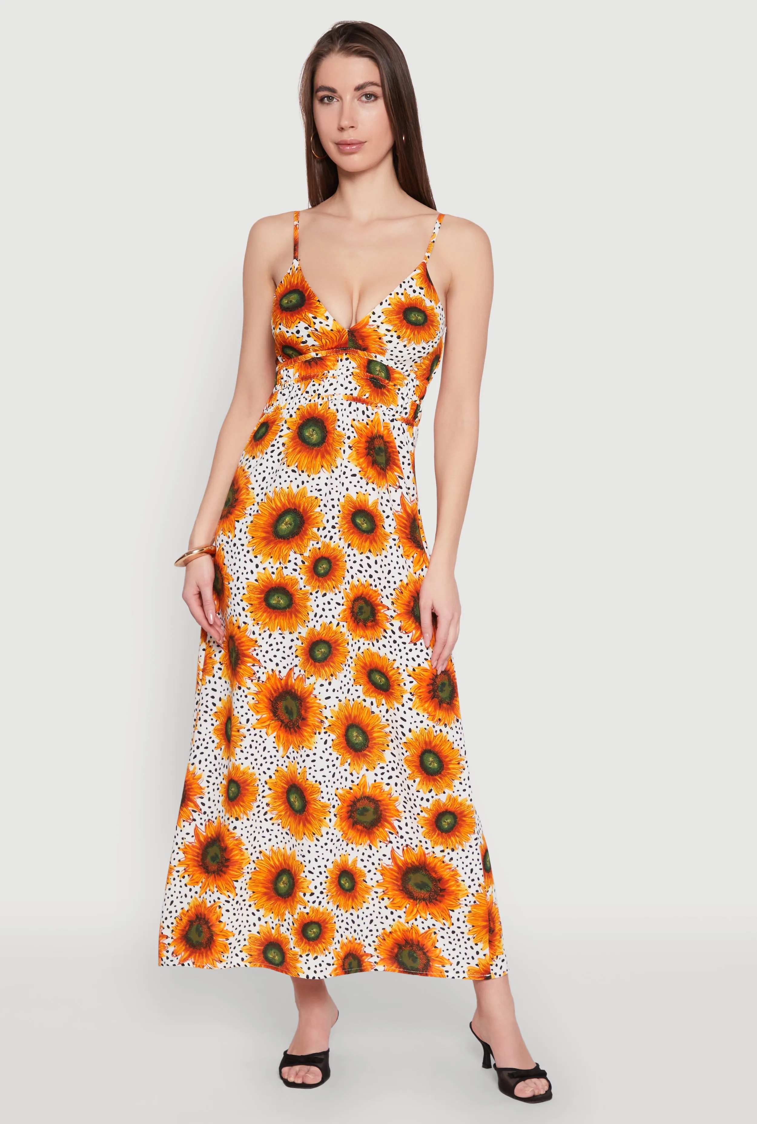 Sunflower Print Empire Waist Dress The sleek lines of this maxi dress create a flattering and elegant look for any event Tropical Air