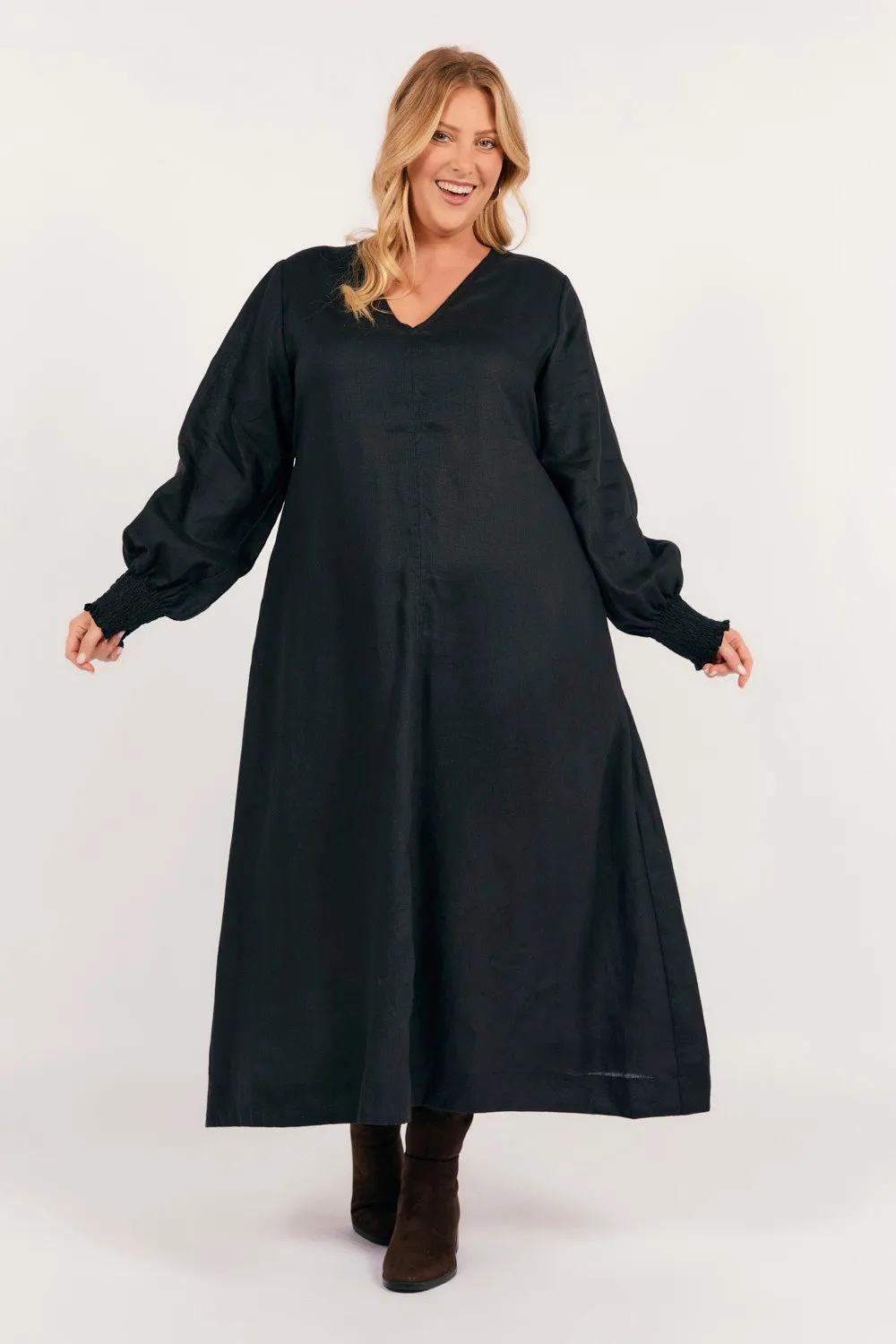 With its elegant design this maxi dress can be styled for a variety of events from casual to formal Wave Dance Tamara Long Sleeve Linen Dress in Black