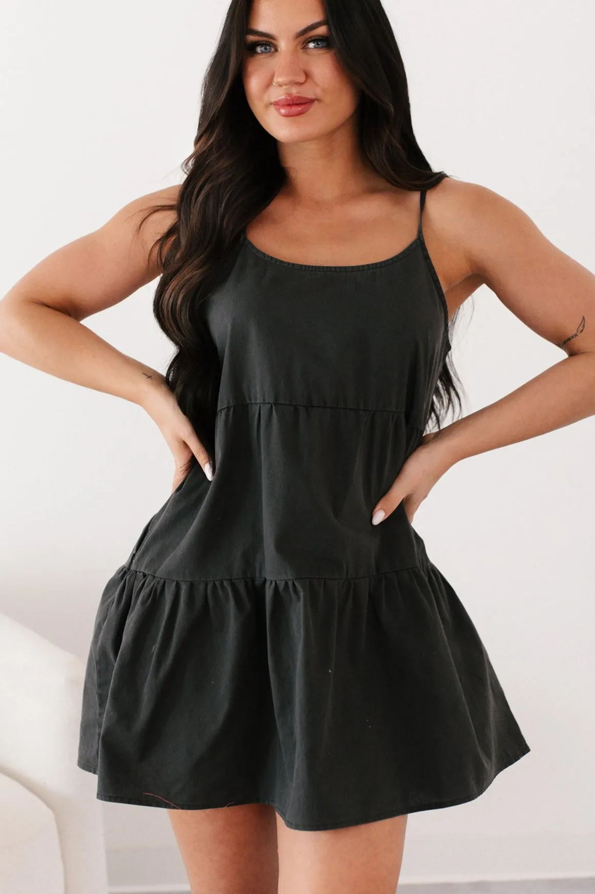 Tempting Eyes Sleeveless Tiered Mini Dress (Black) Effortless Wear