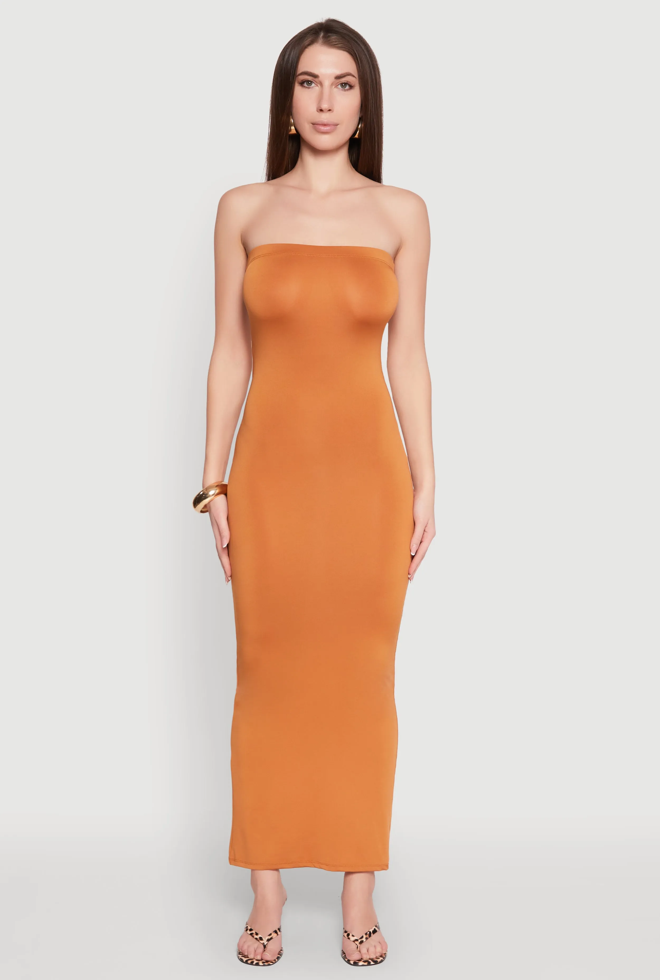 Perfect for layering or wearing on its own this dress adapts to any season Slit Back Maxi Tube Dress